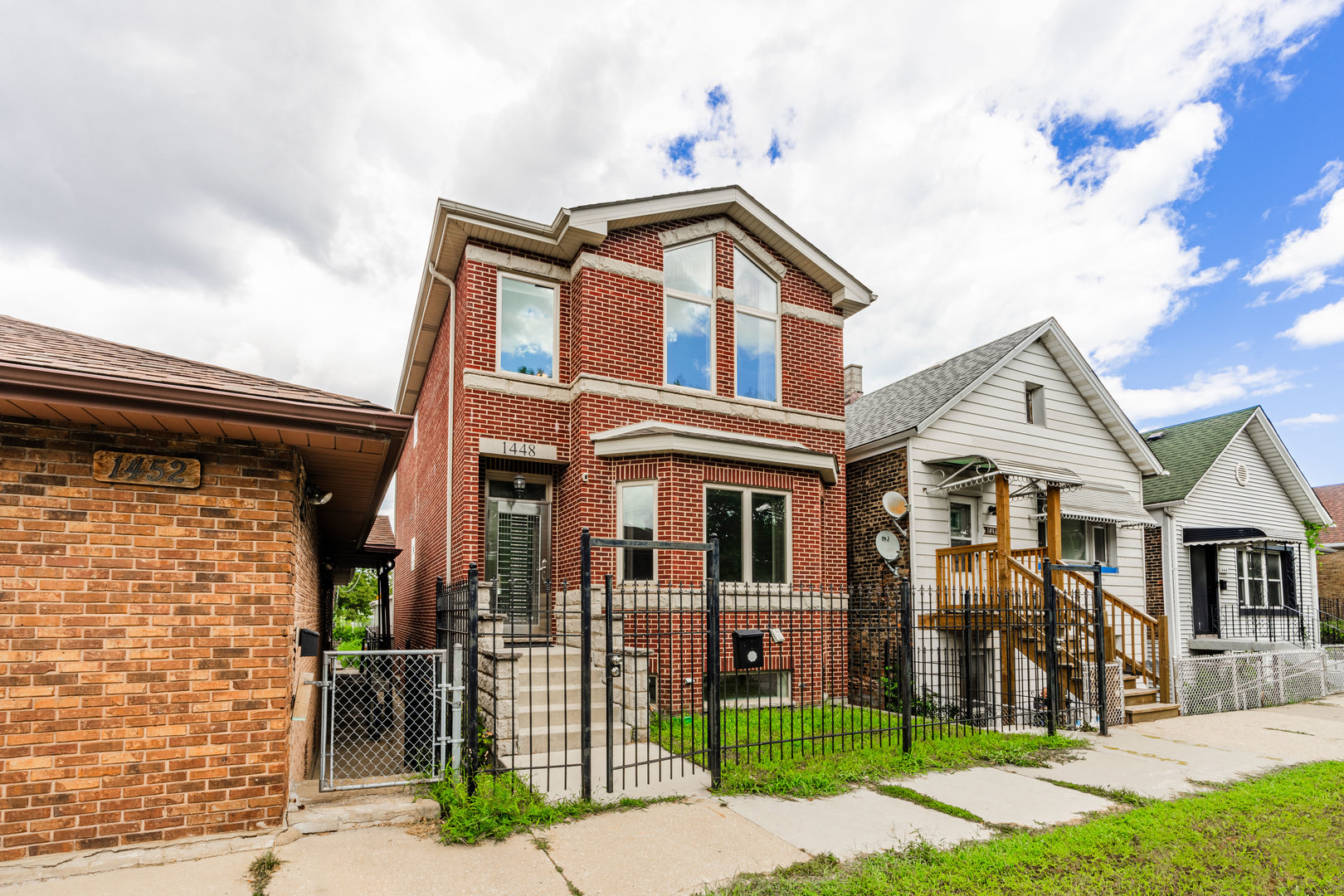 Built in 2017, this 4-bedroom, 3.1-bathroom residence offers a perfect blend of modern luxury and functional design. Upon entry, you're greeted by an open-concept main floor featuring beautiful dark hardwood floors and abundant natural light. The gourmet kitchen with clean white shaker cabinetry, black quartz countertops, and a full suite of stainless steel appliances. The upper level includes 3 bedrooms. The primary bedroom with vaulted ceilings, large windows, and an en-suite bathroom. The home's lower level offers a high-ceiling basement, additional bedrooms and a full bath. The rear deck leads you to the low-maintenance paved backyard. Located just moments from the scenic riverwalk and parks, this home offers the best of city living with a quiet, residential feel, the all-brick exterior ensures durability and timeless curb appeal.