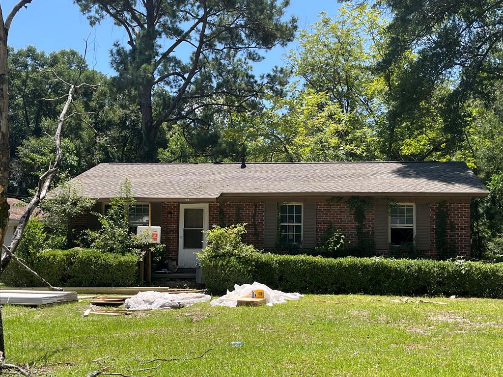 Welcome to 708 Varnedoe Street, Thomasville, GA—This all-brick home combines timeless construction with modern updates. This spacious 4-bedroom, 3-bathroom residence is undergoing an extensive renovation, offering buyers the opportunity to enjoy the feel of a brand-new home while benefiting from the charm of a classic brick construction. The home will feature new flooring, sheetrock, fresh interior paint, a brand-new kitchen with updated cabinetry, new appliances and countertops, renovated bathrooms with new cabinets and countertops, stylish light fixtures, a new roof, new HVAC system, and much more. Every detail has been thoughtfully selected to create a fresh, modern living space that's both functional and inviting. With four bedrooms, three full bathrooms, and a solid all-brick exterior, this home offers plenty of space for family, guests, or entertaining. Conveniently located in Thomasville, you'll enjoy easy access to shopping, dining, schools, and everything this charming South Georgia community has to offer. Don't miss your chance to own this beautifully transformed home. Schedule your showing today.