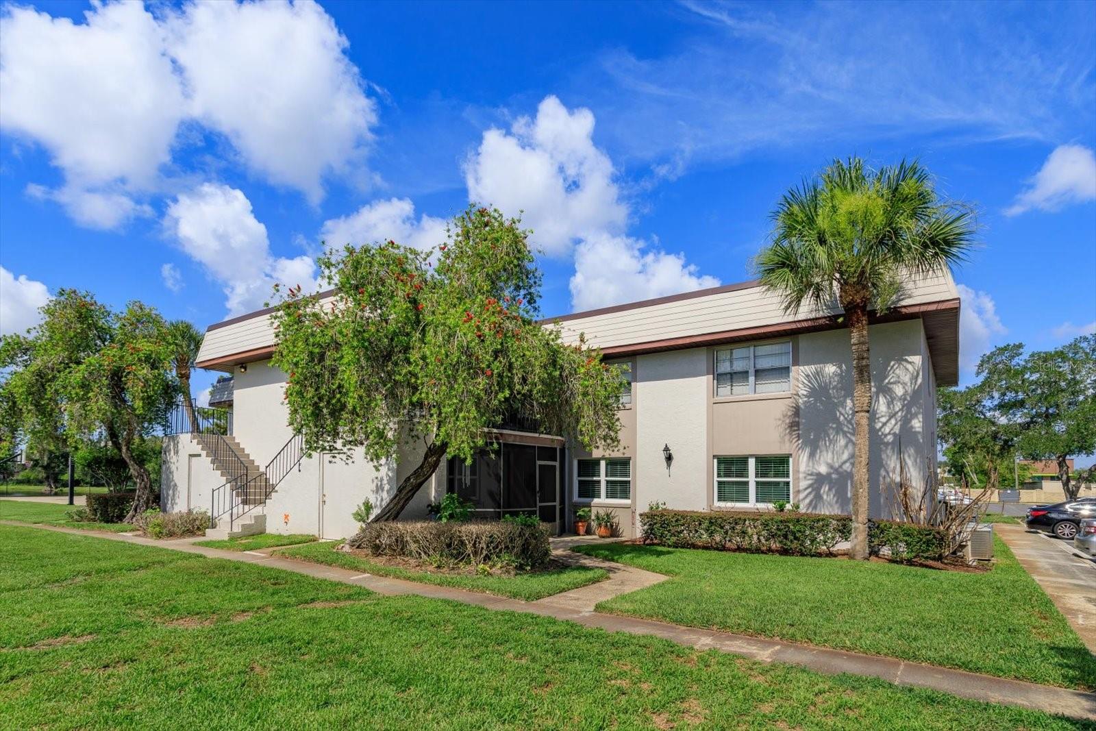 Welcome home to this bright, beautifully maintained and thoughtfully updated first-floor condo in the heart of Winter Garden. This 2-bedroom, 2-bath residence offers 918 square feet of comfortable living space with tasteful improvements and smart use of space throughout.Step inside to an inviting, open living and dining area featuring wood-look luxury vinyl flooring throughout, recessed lighting and an abundance of natural light. Recently replaced windows are an especially valuable improvement, enhancing the home’s fresh, updated feel while offering an upgrade buyers will appreciate for years to come.The kitchen has been tastefully refreshed with granite countertops, a stylish tile backsplash, breakfast bar and thoughtful cabinetry updates, creating a functional space that opens naturally to the dining and living areas.A standout feature is the custom reconfigured laundry and pantry area, thoughtfully redesigned to make the most of the available space. The stackable washer and dryer provides convenient laundry access while allowing for additional organized pantry and cabinet storage—an incredibly functional upgrade that you won’t find in every unit.Both bedrooms are comfortably sized, and the continuous wood-look flooring creates a clean, cohesive feel throughout the home. Additional improvements include a tankless water heater, updated lighting and numerous thoughtful touches throughout.Enjoy your own large covered and screened front porch, offering additional space to relax and enjoy the Florida weather. Combined with convenient first-floor living and a well-maintained community setting, this home offers an easy, comfortable lifestyle in a desirable Winter Garden location.Bright, clean, thoughtfully updated and truly move-in ready—this is a condo that stands out from the rest.