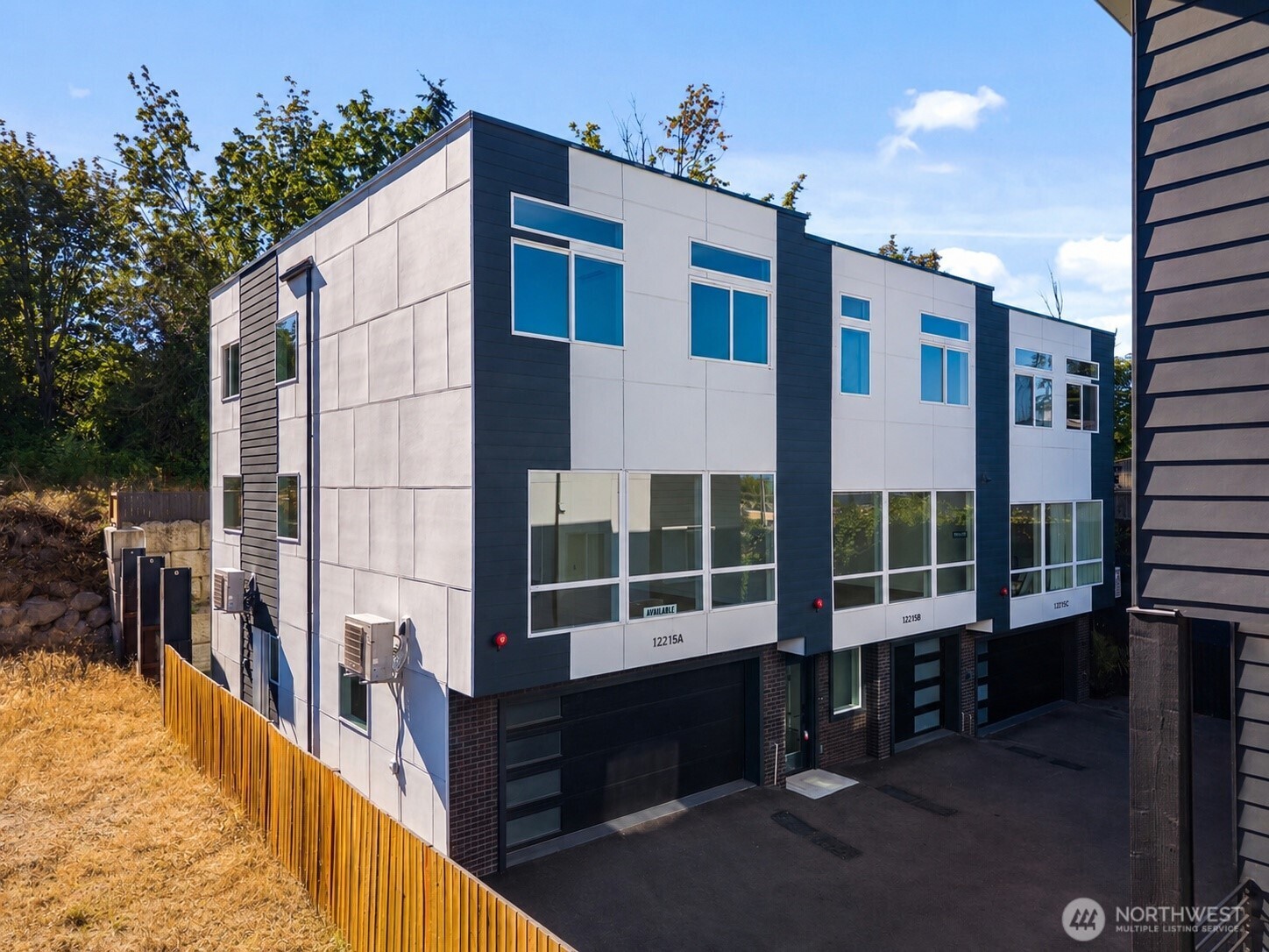 Welcome to Villa Townhomes, a new 9-home community featuring thoughtfully designed 4-bedroom, 3.5-bath residences. The ground level offers a car garage and one bedroom with a full bath. Main level includes open-concept living, dining, and kitchen areas with large windows, plus a half bath. Upper level features a primary suite with a walk-in closet and an en-suite bath, two additional bedrooms, a full bath, a linen closet, and laundry. Builder features include high ceilings, radiant floor heating, ductless mini-split heating and cooling, a tankless water heater, and stainless steel LG appliances. Convenient access to shopping, amenities, freeways, and 8–10 minutes to SeaTac Airport