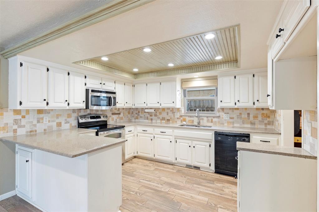 Welcome to 10008 Paisley Road—nestled in an established, quiet neighborhood in Yukon, this thoughtfully designed 3-bedroom, 2-bath home offers 1,854 sq ft of comfort and style. You’ll love the gorgeous kitchen and wet bar, perfect for entertaining guests or enjoying a cozy evening in. The covered patio with a bug barrier creates a seamless outdoor living space for year-round enjoyment. This home is also handicap accessible and features two storm shelters—both above and below ground—for added security and peace of mind. With mature surroundings, convenient location, and standout features, this home is a rare find you won’t want to miss.