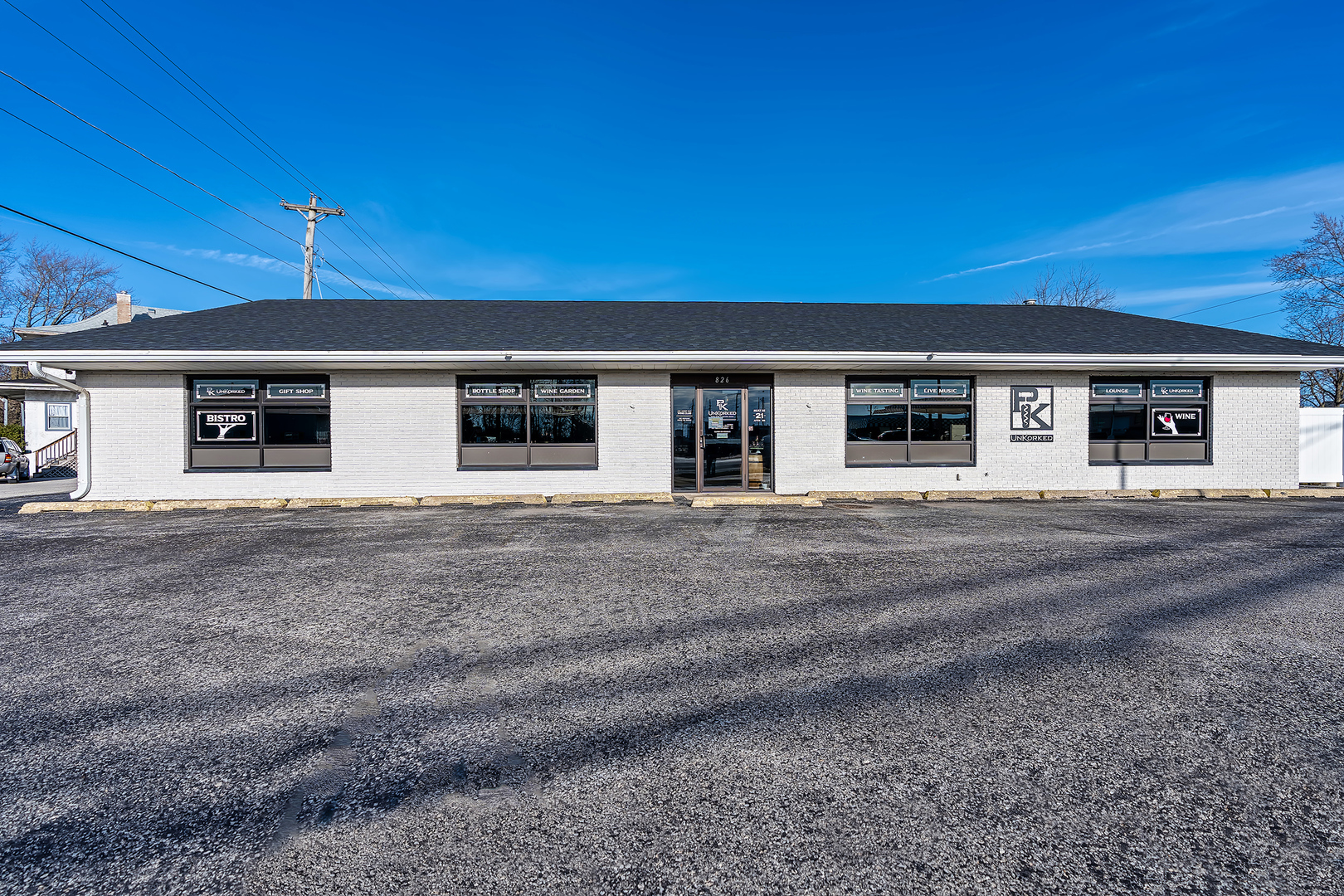 PK UnKorked is located on historic route 66. Remodeled 4 years ago. Fresh exterior paint, a new roof and an added a patio. PK's unique coziness interior design is calming, comfortable and relaxing. When you walk into PK your first reaction is how beautiful it is. The soft lighting with the new light fixtures adds an ambiance while seating in the comfortable leather chairs. The see through fireplace adds a homey feeling.The full  kitchen has lots of counter space with a walk-in cooler and double door freezer for ample food storage. The outdoor patio, includes a great wall and fire pit, and is a great place to enjoy with friends in the spring, summer, and fall. This the building only, not the business.