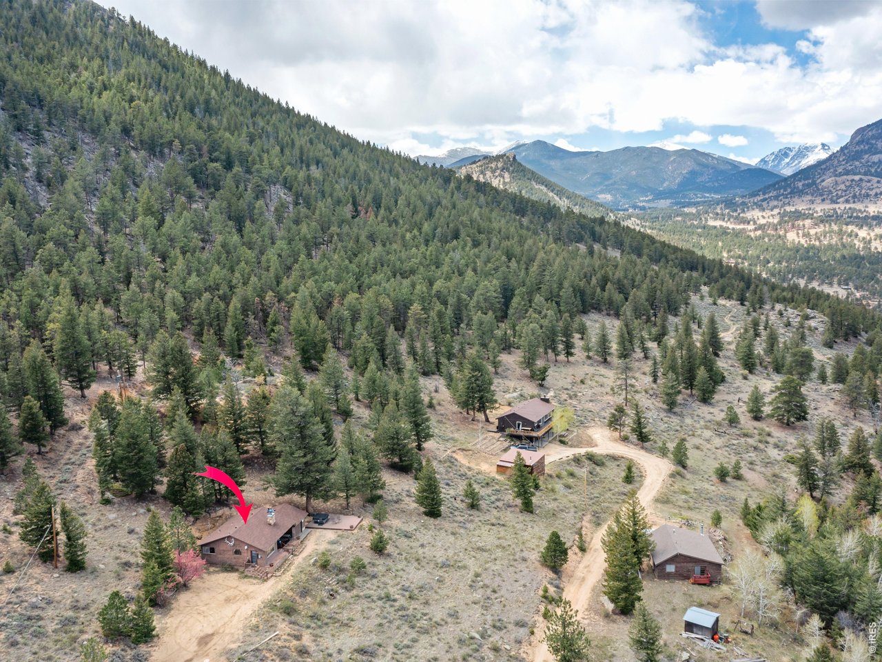 Classic Estes Park Cabin for Sale, 2 Bed, 1 Bath, Stunning Views Bonus: active short-term rental license is currently in place and transferable to the new owner a rare, valuable asset in Estes. Own your piece of the Rocky Mountains with this charming 2-bedroom cabin nestled in the breathtaking views. The perfect mountain retreat. Inside, the cabin exudes warmth and rustic character. The living area centers around a grand stone fireplace - ideal for cozy evenings. In the dining area you can enjoy meals with stunning nature views as your backdrop. Step outside to the deck and unwind in the hot tub while soaking in some of Colorado's most spectacular scenery. This is a rare opportunity to own an authentic Estes Park cabin that offers tranquility, natural beauty, and timeless mountain character - with immediate income potential thanks to the transferable STR license.