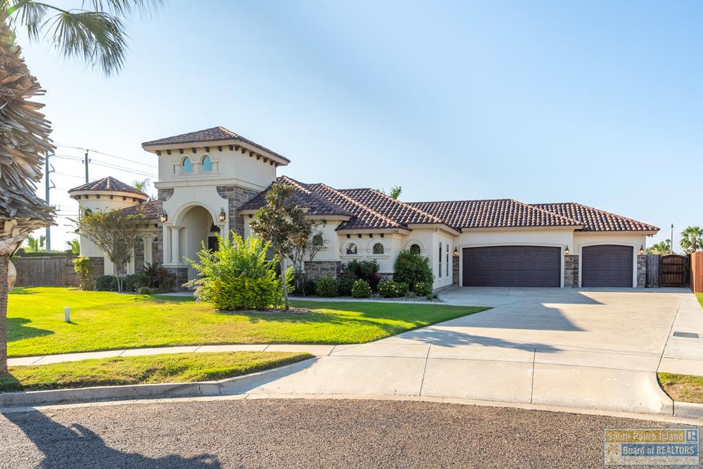 Welcome to this stunning Mediterranean-style Home, gracefully designed for both grand entertaining & everyday comfort. Sprawling & Spacious The home features an expansive living room, Large dining area, and a beautifully designed open floor plan that creates a seamless flow throughout. The oversized kitchen, complete with a large center island, abundant cabinetry, and a full suite of appliances-perfect for hosting gatherings large or small. The thoughtfully planned layout offers excellent privacy with separate bedroom wings, including a well-appointed Jack-and-Jill bathroom. A three-car garage provides ample space for vehicles, storage, and hobbies. Step outside to a true resort-style backyard, where a gorgeous pool anchors the outdoor living space. Enjoy year-round entertaining in the large covered barbecue area, ideal for outdoor dining and relaxation. Community pool, gym.