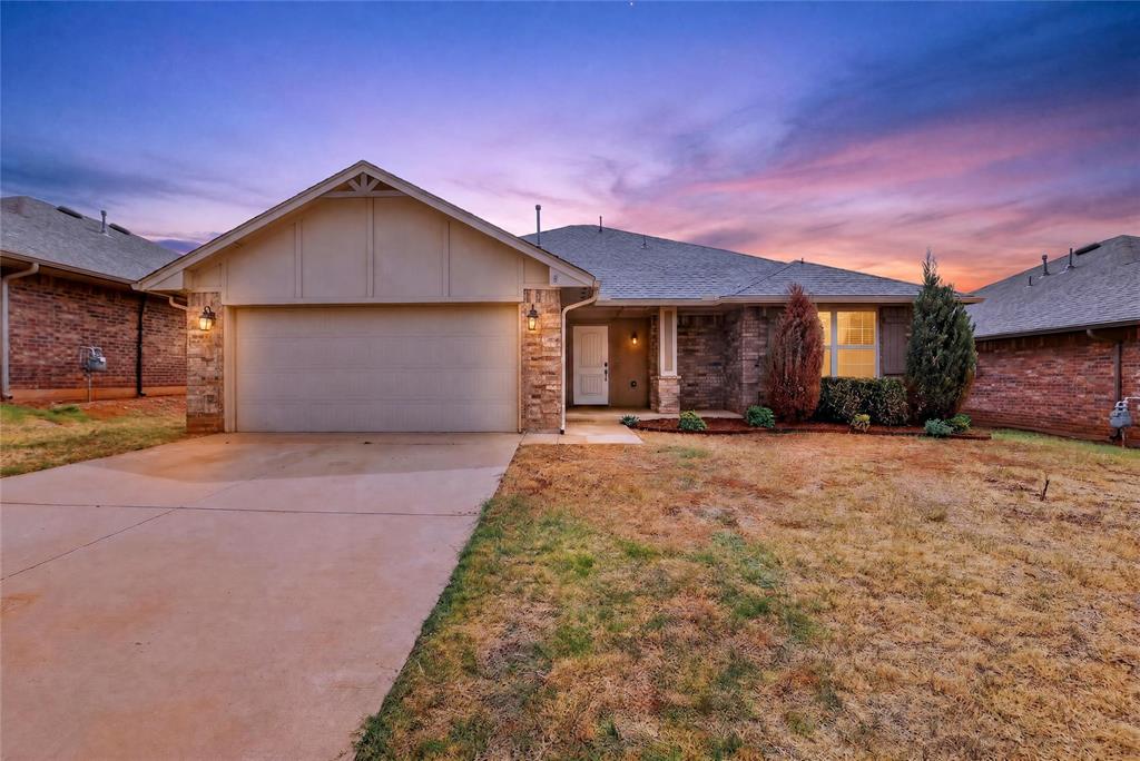 Beautiful home located in the Montague addition and highly sought-after Deer Creek School District! This home features a welcoming front porch, covered back patio, and an open-concept living area with tall ceilings, a gas fireplace, and wood-look ceramic tile flooring. The spacious kitchen offers plenty of quartz countertop space, a breakfast bar, pantry, stainless steel appliances, and under-cabinet lighting.The primary suite features a vaulted ceiling, jetted tub, walk-in tiled shower with glass door, double vanities, and two walk-in closets. Two additional bedrooms share a full bathroom with a tub/shower, built-in vanity, and shelving. Deep, spacious bedroom closets provide plenty of extra storage.Recent updates include fresh interior paint and no carpet throughout the home. Enjoy the large backyard with a wood privacy fence.Conveniently located just minutes from shopping, Hefner Parkway, Mercy Hospital, golf courses, and the Kilpatrick Turnpike. The Montague community offers walking paths and great amenities, including a swimming pool, clubhouse, fitness center, and playground—all within walking distance.