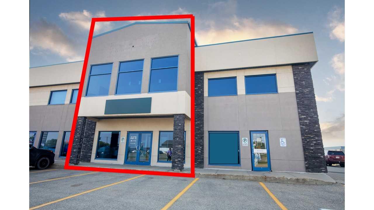 Office Condo Bay with great exposure.  Features two floors of premium office space with a small rear shop.  Main floor office area is 1380 sqft with reception, 5 offices, two bathrooms, small kitchen and storage room. Front vestibule allows separate access upstairs to 1495 sqft of 4 offices, a large bright board room and bathroom.  Also, there is a 690 sqft shop area in the rear with an over head door and small mezzanine.  Currently there are tenants in two offices upstairs that have access to the board room for $775 per month gross each with two more vacant ones that could be rented, and the back shop area is rented for $1300 gross per month.  All 3 current tenants would like to stay if possible. This is a great opportunity to run your office out of the main floor and have your mortgage mostly covered by the other tenants in the building and also allow you the flexibility to grow in the future. The main floor office space would be available upon possession.  Building offers flexible options for keeping as an income property, partial income and owner use, or complete owner occupation. Lots of possibilities.