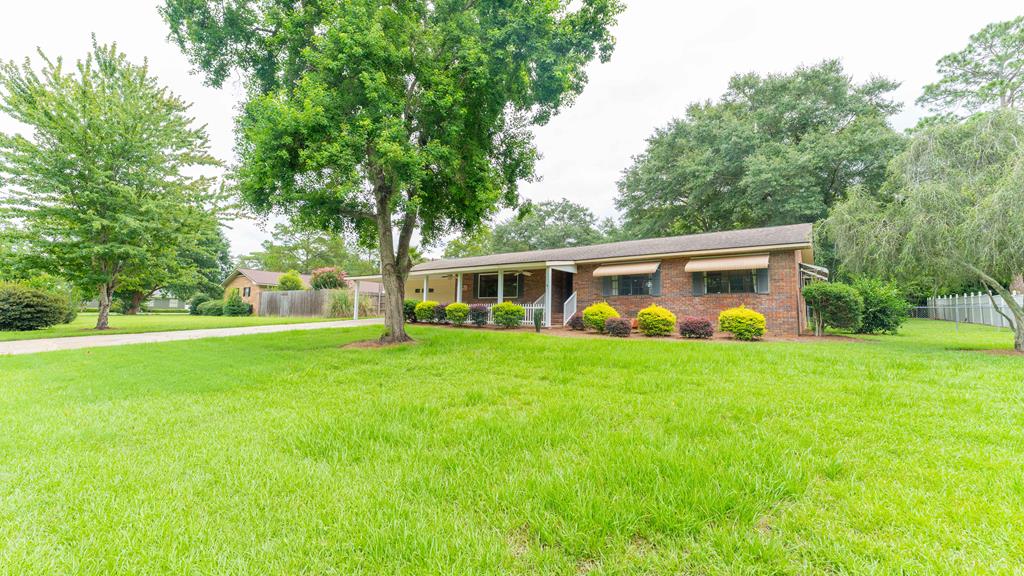 JUST REDUCED! Traditional Brick home tucked away in a quiet neighborhood, yet conveniently located near Highway 84 for quick commuting, and close to shopping, hospital and other dining amenities. As you enter the front door, you will see a large great room that gives you several seating arrangements: dining, fireplace and TV, lounging. A beautiful back yard will provide you with shady days and blooming plants to enjoy family gatherings. The large storage building workshop is wired and perfect for landscaping, construction tools. As you exit at the kitchen door to the nice large back concrete pad, there is a covered patio that has a Hot Tub and Swing. Call your Agent today to schedule a viewing. You won't be disappointed. Yes, it might be a 1978 Vintage home but has been maintained and waiting for you to enjoy and/or add your deco theme to!