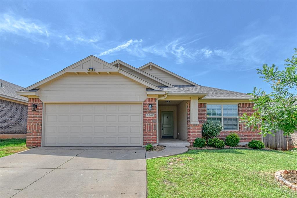 Charming, clean, and move-in ready!! This 4 bedroom home is nestled in the popular Valencia neighborhood in Edmond, while in the Deer Creek school district. Inside you'll find an open concept layout that is great for keeping company and playing chef all at the same time! Cozy up to the gas fireplace on chilly nights or spend warm, sunny days relaxing on the covered patio that overlooks a fully fenced back yard. The split floorplan allows for distance between the primary suite and secondary beds/bath! The kitchen features tiled backsplashes, quartz countertops, and stainless appliances with a gas range. The home offers a lot of natural light throughout and energy efficiency for lower monthly costs! Valencia is loaded with parks, trails, sports fields, and a splashpad!! Owner licensed.