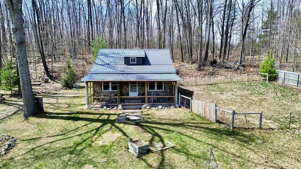 13 Acres of Prime Hunting Land Adjoining State Forest Look no further for the perfect hunting retreat or year-round residence. Known historically as the Echo Lodge, this unique 3BR/1BA stone cottage sits on 13 acres of top-tier hunting ground, offering direct access to adjoining State Land. The interior features a massive, authentic stone fireplace and an expansive family room designed for gathering after a long day in the woods. For the outdoor enthusiast, the infrastructure is unmatched: a large garage provides ample space for all your toys, complemented by a separate workshop area for projects and gear maintenance. Added versatility sets this property apart: a dedicated septic tank is already in place for an RV hookup, making it the ultimate setup for hosting extra guests or parking the rig for the season. Whether you are tracking trophy bucks on your private walking trails or hitting the nearby ORV and snowmobile routes, this is the ultimate basecamp. This legacy property didn't even make it to the open market last time it sold-act fast to secure your piece of Atlantas outdoor heritage.
