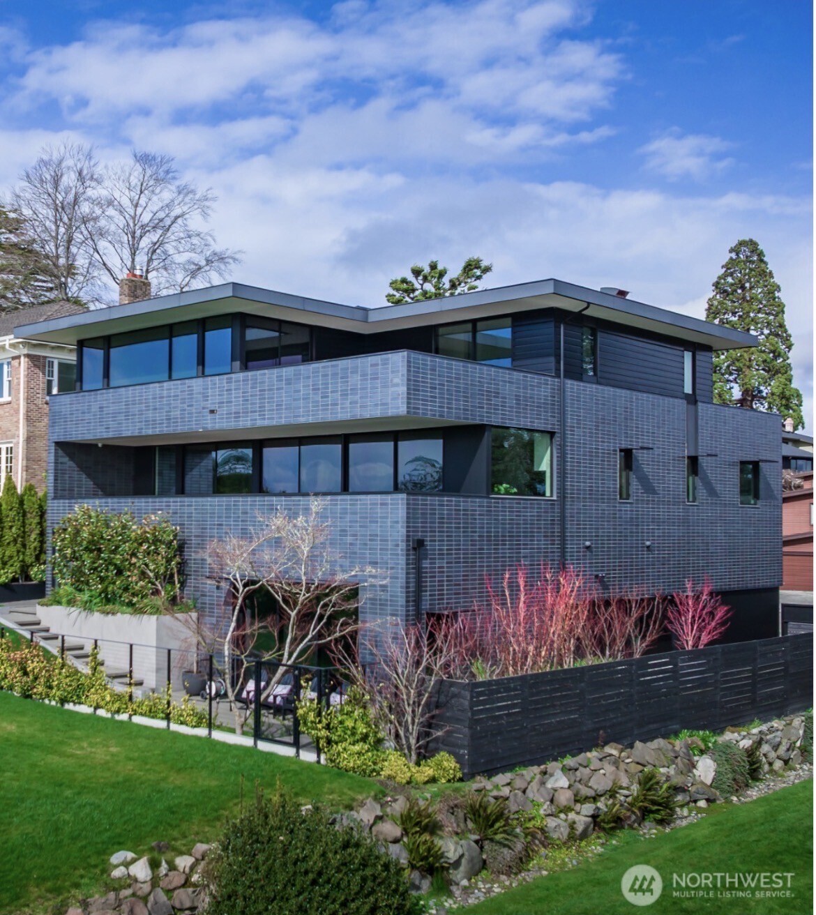 Introducing The Viewpoint Residence, envisioned for the connoisseur of exceptional craftsmanship. Designed by Chadbourne + Doss Architects, every inch of this extraordinary modern estate redefines luxury living. Thoughtfully sited on the premier lot along Seattle’s prestigious Magnolia Bluff, each room was conceived to capture the dynamic beauty of the Pacific Northwest, with sweeping vistas from Downtown Seattle to Mount Rainier, across Puget Sound, and extending to the Olympic Mountains and beyond. Glorious, light-filled interiors reveal breathtaking architecture paired with state-of-the-art systems, including a private elevator, car elevator, and top-of-the-line technology throughout. The Viewpoint Residence is more than a home—it is an experience unlike any other.