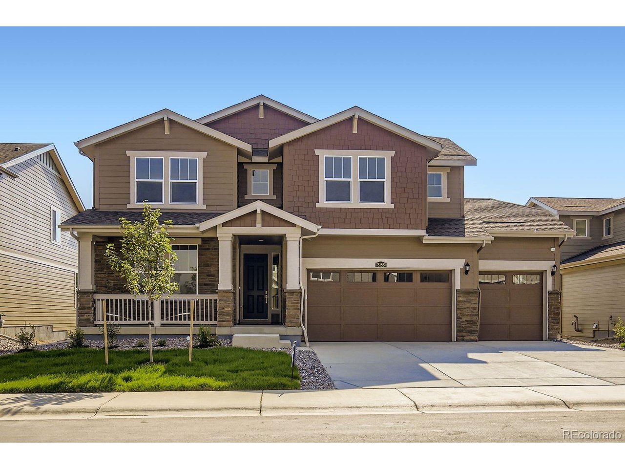 ***Contact builder today about Special Financing for this home - terms and conditions apply** Completed new construction in Loveland offering space, flexibility, and a rare setting backing to a walking path with mature trees for added privacy and natural views. This 2-story home features a thoughtfully designed layout with a main-level Next Gen suite, complete with its own living area, kitchenette, bedroom, and bath-ideal for multi-generational living, guests, or extended stays. The open-concept main living area centers around a spacious kitchen with slab quartz countertops, stainless steel appliances, and a large island that flows into the great room and dining space. Upstairs, the owner's suite includes a private bath and dual walk-in closets, while three additional bedrooms, multiple baths, a loft, and a convenient upstairs laundry provide room for everyone. The garden-level basement with 9 ft ceilings brings in natural light and offers excellent potential for future finishing or additional living space. A 4-car tandem garage adds flexibility for storage, hobbies, or extra vehicles. Energy-efficient construction supports long-term comfort and savings, all in a location that blends convenience with outdoor access.