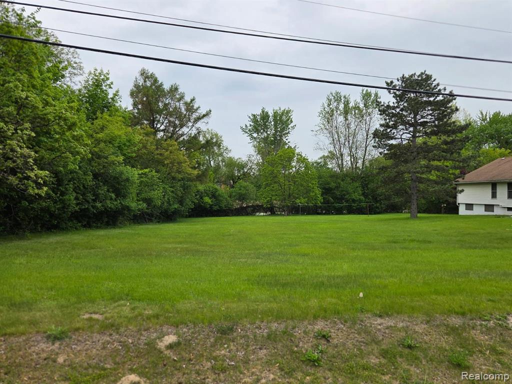 Prime 5.82 acres in West Bloomfield Township on Pontiac Trail.  3.82 acres Plus ID# 20250036833 with an additional 2 acres included in the sale making a total of 5.82 acres ready for redevelopment.  Value is in the land. Property is being sold as is.  Do not enter the property without prior appointment as home is still occupied. One of the last large parcels left to build your single family dream house or an enclave of single family homes or condos* currently zoned Residential. Property is occupied. Please do not go up driveway or walk property without an appointment. BATVAI  All showings must be accompanied by a licensed realtor. Splits and/or zoning changes are subject to buyer's sole efforts and expense in working with municipality.