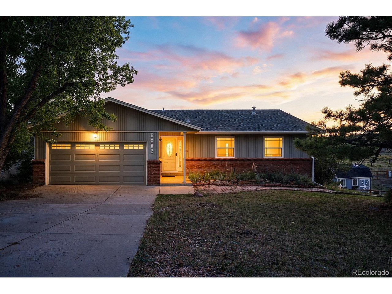 Exceptional location in The Pinery!!  Charming walk-out ranch poised on a .41 acre site backing to a conservatory/open space that will never be built on with views of the Colorado Golf Club golf course * Lovingly maintained home featuring main floor living at it's best *  Enjoy an open floorplan with a vaulted great room that includes crown molding and a gas fireplace, dining area with a bar sink and beverage refrigerator, bright white kitchen with an island/breakfast bar, newer appliances including an LG refrigerator, KitchenAid dishwasher, induction range, and a Whirlpool microwave * Primary suite features a walk-in closet with an updated ensuite bath and access to the deck * Two additional bedrooms on the main level with a full bath * Relax on the expansive covered Trex deck (new in 2022) highlighted with a beautiful iron railing, while enjoying the private backyard and pastoral views surrounded by nature * The walk-out lower level has a cozy family room with a fireplace, a 4th bedroom and 3/4 bath, a bonus room that has a kitchenette that includes a stove, microwave and full size refrigerator, and plenty of room for crafts and projects, plus a woodworker's dream workshop with an air filtration system and space for everything you could possibly need * Newer hot water heater and Lennox furnace and a/c * Water softener * New roof in 2024 * Newer washer and dryer * Shed in the backyard is perfect for yard and gardening tools * This home makes you feel like you are miles away from the hustle and bustle of Denver, yet it is conveniently close to several golf courses, trails, Downtown Parker, and one of the top school districts in the nation *. Incredible opportunity!!