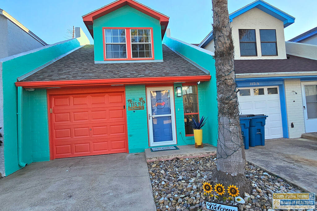Turnkey South Padre Island townhome about a 2-minute walk to the beach. This well-kept 2-bedroom, 2-bath unit is bright and filled with natural light, with two sliding glass doors opening to the backyard patio. Features include tile throughout, fresh interior and exterior paint, a roof replaced within the last 5 years, and a new HVAC system installed in October 2026. The kitchen connects to a dedicated dining area, and a bonus sleeping nook adds flexibility. Outside, a large, fenced yard is framed by mature palms and lush tropical landscaping, with patio seating, garden space and a grill. A 1-car garage with laundry plus a driveway provide parking and storage. Currently operating as an active short-term rental with established booking history offered tastefully furnished. Rental performance information available to qualified buyers. Buyer to verify square footage, year built and all information.