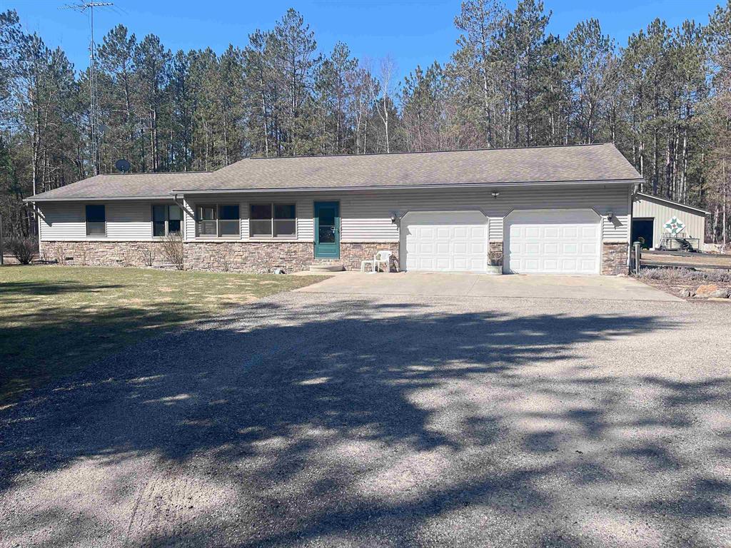 A property with it all. 20 acres of beautiful woods, a 32' x32' pole barn on a concrete pad and a 23' x 28' heated wood shop with a 3/4 bath and separate gardening room. This 2000 sq ft 3 bedroom 2 baths home has hardwood floors in the LR and DR. The views from all the windows overlooks the colorful seasons and the wildlife is amazing. Both the pole barn and woodshop have a metal roof for many years of protection. Don't hesitate as many have been looking for property like this so activity should be high.Call me to schedule a showing. Each 10 acres has separate Tax ID.