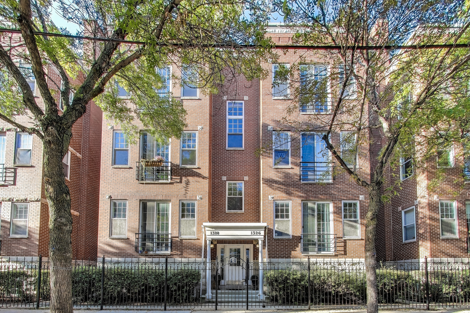 Nestled in the heart of Chicago's vibrant Southport Corridor and located within the highly sought-after Burley School District, this spacious 3-bedroom, 3-bathroom duplex down condo offers the perfect blend of style, comfort, and convenience. The main level features an open-concept living space bathed in natural light from a full wall of southern-facing windows, creating a warm and inviting atmosphere. The updated kitchen is a chef's dream, boasting 42" cabinets, stainless steel appliances, and an oversized island ideal for entertaining. Oak hardwood floors run throughout the main level, complementing the elegant finishes and the cozy gas fireplace in the living room. All bedrooms are generously sized, including a luxurious primary ensuite with custom closets and a spa-inspired bathroom. With three full baths, there's plenty of space for family and guests. Step outside to enjoy your private outdoor patio-perfect for grilling, relaxing, or hosting summer gatherings. One dedicated outdoor parking spot is included, and you're just steps away from Southport's renowned dining, shopping, and public transit. This home is a rare find in one of Chicago's most desirable neighborhoods