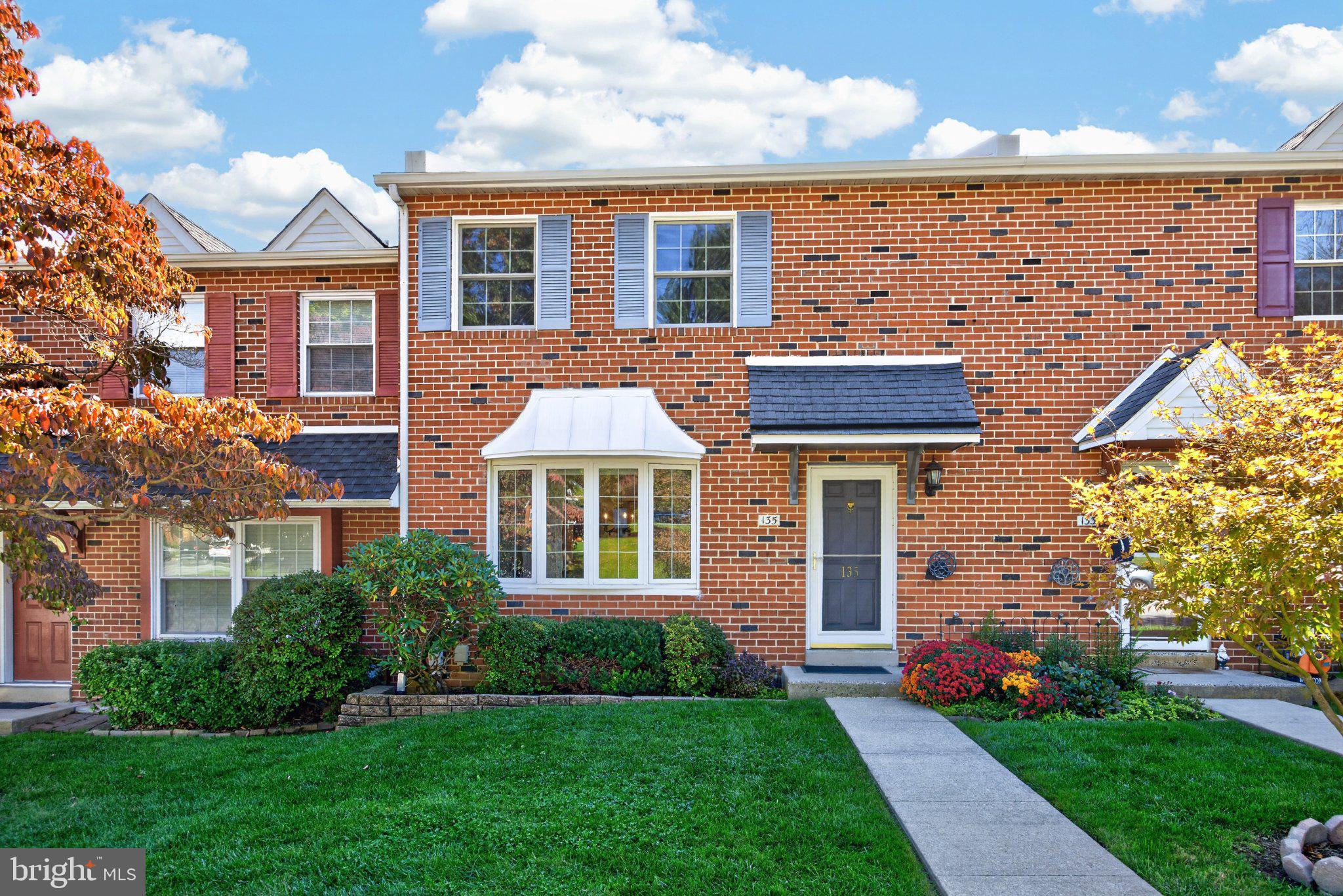 Nestled in the charming Rhondda community in the award-winning Downingtown School District, this exquisite and METICULOUSLY maintained townhome offers a perfect blend of luxury and comfort. With 1,760 square feet of thoughtfully designed living space, this home features three spacious bedrooms and two and a half elegantly appointed bathrooms, ideal for both relaxation and entertaining. Step inside to discover the warmth of rich 3-inch oak wood floors that flow seamlessly throughout the main living areas, complemented by the inviting ambiance of a wood-burning fireplace, perfect for cozy evenings. A large 19'x14' deck allows you to enjoy one of the most peacefully private locations in the community. The second level features a large primary bedroom with his and her closets, custom deep-set poplar windowsills, and an updated en suite full bath with stall shower. Two additional well-sized bedrooms, a full bath with tub shower and a laundry area complete this level. The  finished, daylight basement provides additional space for a home gym, media room, or personal retreat, enhancing the versatility of this spotless residence and features a 9 lite  door, large chest freezer, a private workshop, and additional room for storage. The exterior boasts classic brick construction, exuding timeless elegance, while the community amenities elevate your lifestyle. Enjoy sunny afternoons by the in-ground community pool or engage in friendly matches at the nearby tennis courts. The beautifully landscaped surroundings, complete with sidewalks and street lights, create a welcoming atmosphere for leisurely strolls. With off-street parking and a prime location, this home offers both convenience and tranquility. This is more than just a home; it's a sanctuary waiting for you to create lasting memories. Upgrades include an attic fan for additional cooling, , newer windows throughout, speaker system hook-up in the basement, gardens front and rear.and many more. This is a MUST-SEE!