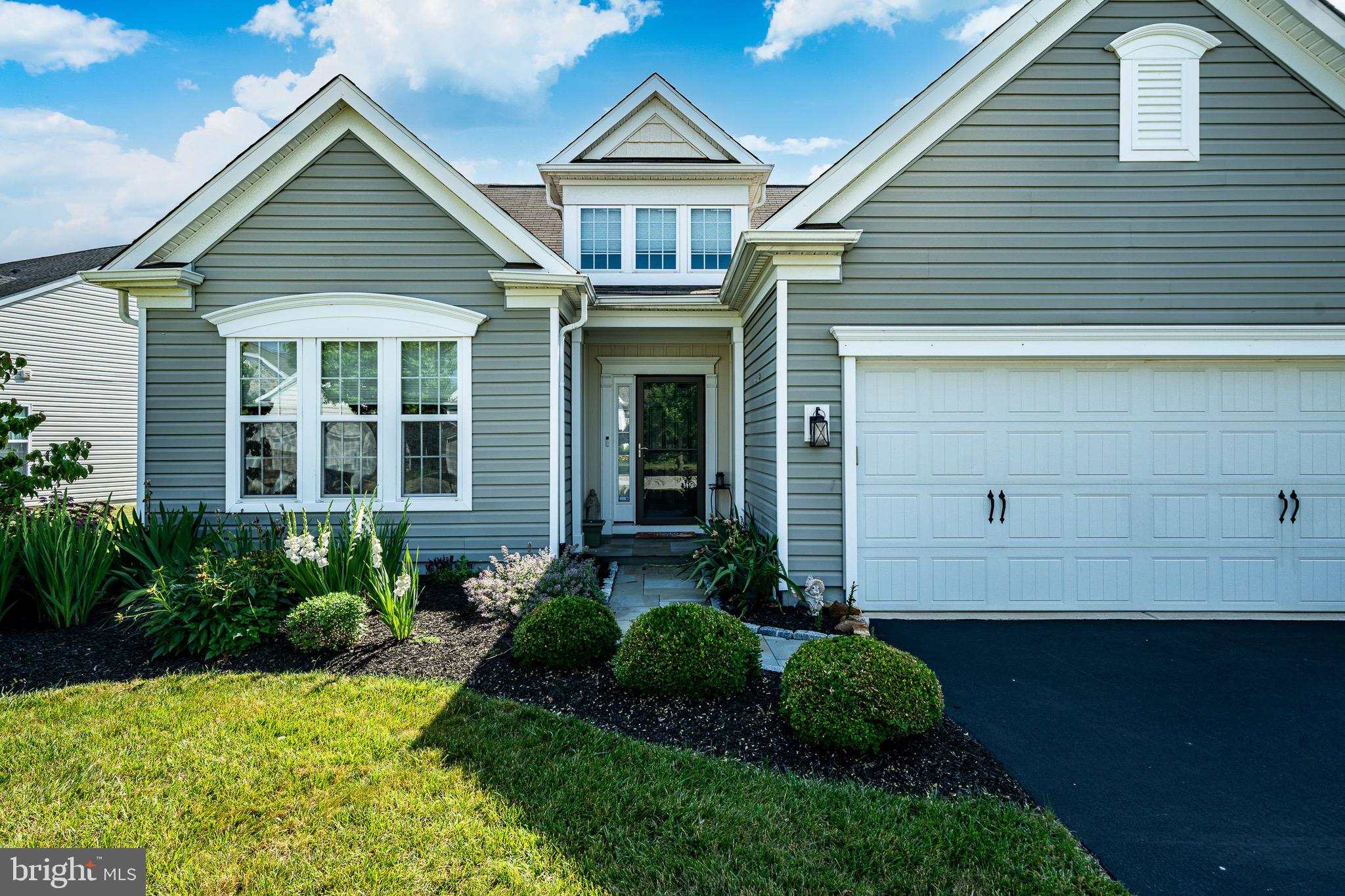 Welcome to 443 Hallman Court, an exceptional home in the sought-after Village Singles at Applecross Country Club, where elegant design, spacious living, and low-maintenance convenience come together. This beautifully appointed 4-bedroom, 3-bath home offers an expansive, thoughtfully designed floor plan with the perfect blend of everyday comfort and effortless entertaining.Step inside to discover gorgeous wide-plank hardwood floors that flow throughout the main living areas, creating a warm and inviting atmosphere. The heart of the home is the stunning gourmet kitchen, featuring rich cabinetry, granite countertops, a large center island, stainless steel appliances, and an open layout that overlooks the spacious living and dining areas.The desirable first-floor primary suite provides a private retreat with generous closet space and a well-appointed en-suite bath, allowing for true one-floor living. The first floor has 2 additional bedrooms, and another full bathroom. A bright and inviting enclosed sunroom extends your living space year-round and offers the perfect place to enjoy morning coffee, unwind with a book, or entertain guests while taking in peaceful views.Upstairs, a versatile loft creates the ideal second living area, home office, or hobby space, complemented by an additional bedroom and full bath—perfect for visiting family or guests seeking privacy.Additional highlights include a 2-car garage,  ample storage, and a flexible floor plan designed to accommodate a variety of lifestyles.Located in the award-winning Applecross Country Club community, residents enjoy resort-style amenities including golf, indoor and outdoor pools, fitness center, walking trails, tennis courts, a clubhouse, and more—all just minutes from major routes, shopping, dining, and the train and located in the Downingtown Area School district and minutes from the prestigious STEM Academy.  Don't miss the opportunity to own this beautifully appointed home in one of Chester County's most desirable communities, Live where you Play!