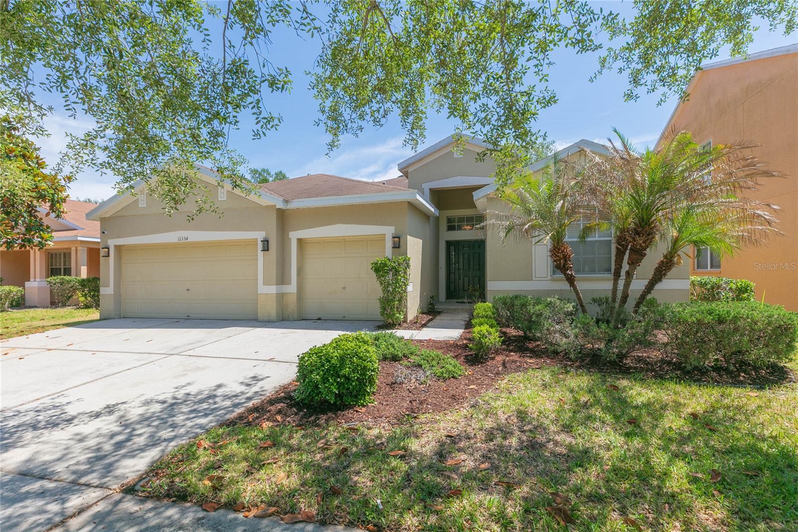 Seller is open to buyer incentives with acceptable offer. Welcome home to this beautifully maintained 4-bedroom, 3-bath residence located in a quiet Riverview enclave offering privacy, mature oak trees, and peaceful low-traffic streets. With nearly 2,300 sq ft of open living space, this home features high volume ceilings, brand-new interior paint, and a thoughtful split-bedroom layout that provides both function and comfort. The spacious kitchen includes wood cabinetry, decorative countertops, and a breakfast area that opens to the large great room—perfect for everyday living and entertaining. The separate living and dining areas add versatility, while the oversized primary suite offers a relaxing retreat with dual walk-in closets, a garden tub, separate shower, and dual sinks. Additional upgrades include custom lighting and fans, interior laundry room, alarm system, and pre-wired high-speed internet options. The 3-car garage provides ample storage or space for a workshop or fitness area. Enjoy a fully fenced backyard with no rear neighbors, a covered lanai, and plenty of room for a future pool. Located in the desirable Rivercrest community, residents enjoy access to resort-style amenities including pools, parks, playgrounds, recreation center, sports courts, and walking areas. This well-cared-for home is move-in ready, and the seller is prepared for a quick closing. Don’t miss this opportunity to own a spacious 4/3/3 in a prime Riverview location.