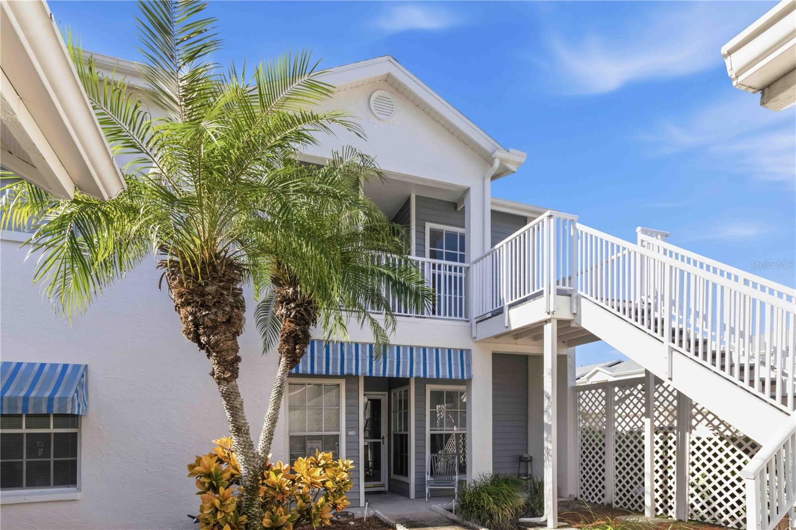 LAGOON VIEWS! 3 BEDROOMS! PRIVATE GARAGE! MINUTES TO INDIAN ROCKS BEACH! Enjoy the Florida lifestyle in SHIPWATCH YACHT & TENNIS CLUB, where mornings on your screened lanai can turn into afternoons at the pool, a game of pickleball, or an evening watching the boats along the Intracoastal! This SECOND-FLOOR, 3-BEDROOM, 2-BATH condo offers 1,430 SQ FT, NEW FLOORING THROUGHOUT, and a DETACHED ONE-CAR GARAGE—all in a waterfront community with plenty to enjoy close to home! Step inside to a spacious living and dining area with soft neutral colors, natural light, and room to arrange your furniture without feeling crowded. Sliding glass doors open to the screened lanai, extending your living space outdoors and bringing the greenery and lagoon views into the room. The bright EAT-IN KITCHEN features white cabinetry, wood-look flooring, a LARGE PANTRY, and a sunny breakfast nook with a big window overlooking the screened in balcony and pond. A pass-through connects the kitchen to the dining area, making it easy to serve dinner and stay part of the conversation. 3 BEDROOMS give you options for guests, a home office, hobbies, or everyday living. The spacious MASTER BEDROOM SUITE includes a WALK-IN CLOSET and a private bathroom with DUAL SINKS, a large vanity with plenty of counter and cabinet space, and a separate shower. An INSIDE LAUNDRY CLOSET keeps the washer and dryer conveniently tucked away. Outside, on the SCREENED LANAI —bring your coffee, settle into a comfortable chair, and enjoy the pond view. Your PRIVATE ONE-CAR GARAGE adds covered parking and storage for beach gear, bikes, and the extras you want out of the house. Shipwatch makes it easy to find something to do most any day with TWO SWIMMING POOLS, TENNIS & PICKLEBALL COURTS, an exercise room, TWO CLUBHOUSES, and a PRIVATE MARINA, with landscaped grounds and scenic ponds throughout the community. Head over to nearby INDIAN ROCKS BEACH for sandy toes, a Gulf sunset, or dinner at one of the local restaurants, then come home to your own peaceful place just off the coast. Whether you’re looking for a full-time home or a seasonal getaway, this condo brings together the space, storage, views, and amenities that make Florida living so enjoyable! Schedule your showing TODAY!