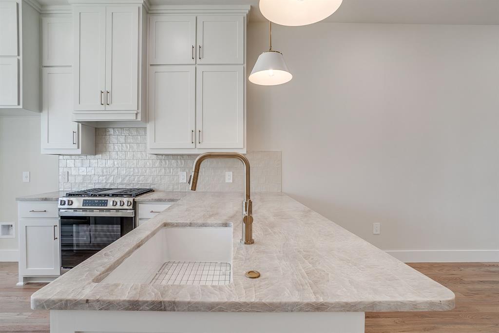 Nestled just steps from Linwood Park, this condo places you at the center of Fort Worth’s most vibrant lifestyle. Walk to Target, boutique fitness studios, and enjoy quick access to Camp Bowie and some of the city’s finest restaurants. You’re also just minutes from the new $1.7B Westside Village development, the UNT Health Science Center, and only three miles from TCU and Texas A&M Law School. Here, exceptional design meets an unbeatable location, creating a home where style, convenience, and luxury come together effortlessly. Imagine calling this three-story condo with panoramic city views home. Every detail has been thoughtfully designed, from the designer finishes and open-concept layout to the abundance of natural light that fills the space. The chef-inspired kitchen seamlessly flows into the living and dining areas, perfect for entertaining or relaxing in style. The third floor features a spacious primary suite with a walk-in closet and spa-like ensuite bathroom, along with a secondary bedroom complete with its own walk-in closet and ensuite bath. A conveniently located utility room adds everyday ease. Step up to the fourth-floor rooftop terrace, where skyline views set the perfect backdrop for evening gatherings or a quiet morning with coffee. Sophisticated, low-maintenance living in a prime Fort Worth location—this is urban luxury at its finest.