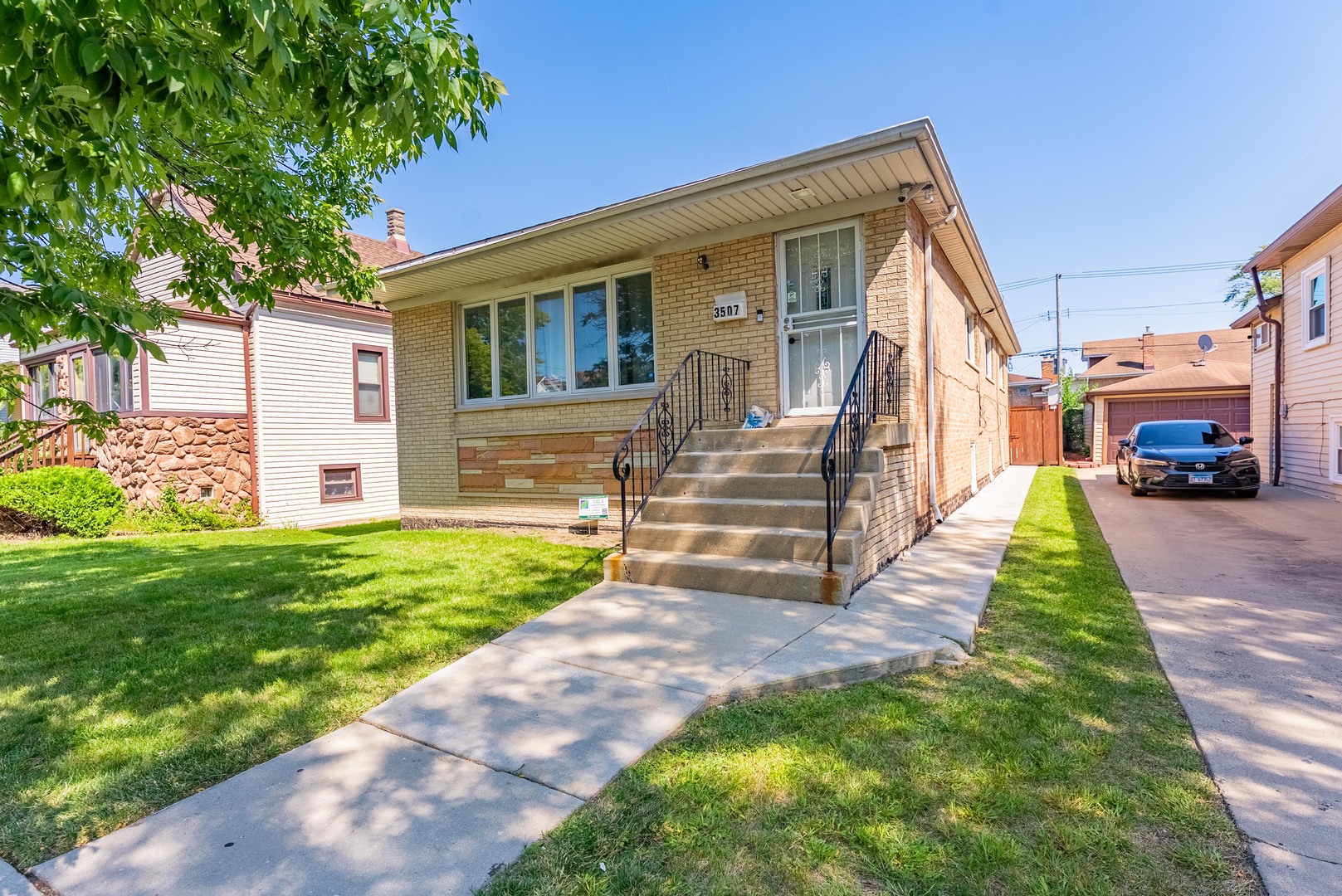 Welcome to this beautifully updated 4 bedroom, 2.5 bath home on Chicago's North Side, blending modern upgrades with comfort and functionality. Step inside to find a spacious main level with new hardwood floors, fresh paint, and recessed lighting (2021) that brightens every corner. The kitchen was fully rehabbed in 2020, offering a sleek and stylish space with plenty of room to cook and entertain.    Upstairs, you'll find generously sized bedrooms and a fully rehabbed bathroom (2024) designed with today's finishes. The lower level offers additional living space with new vinyl flooring, a full bathroom, and a built-in tub - perfect for relaxation or hosting guests.    Peace of mind comes easy with all new plumbing (2019), updated electrical, new washer/dryer (2021 with 7-year warranty), and fresh paint throughout. Outside, enjoy the ease of a new concrete sidewalk and backyard patio, a double-door garage with built-in gazebo, a Tesla charger, and a new fence (2021) for privacy and style.    This home checks every box - move-in ready, thoughtfully upgraded, and designed for modern living. Don't miss the chance to own a North Side gem that combines location, quality, and convenience.