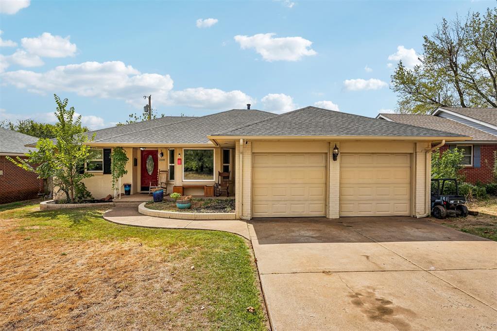 Classic character and everyday convenience come together in this south Edmond home, cared for by multiple generations of the same family. A bright white palette welcomes you inside, where the living space to your right features a generous bay window and flexibility for a homeschool room, work from home office, or inviting sitting area. Down the hallway, the primary bedroom offers a walk-in closet and a bathroom with vintage charm that complements the home’s classic style. The second living area centers around a floor to ceiling brick fireplace, with an exterior door leading to a large patio and spacious backyard. Another bay window brings natural light into the dining area beside the kitchen, where an updated backsplash and ample countertop space blend with original character. The original oven remains a well-used part of the kitchen, where the owner bakes large sourdough orders. YUM! Newer carpet, a roof replaced in 2023, and a two car garage add to the home’s appeal. Nearby shopping and dining along Broadway and 33rd Street, plus convenient access to UCO and north Oklahoma City, put everyday essentials within easy reach. With spaces to gather, room to make it your own, and a history of being loved, this home is ready for its next chapter.