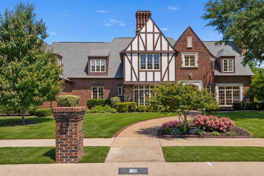 Custom English Tudor situated on an oversized lot with timeless architecture, incredible curb appeal, and luxury details throughout. This remarkable home features a fully updated chef’s kitchen that opens seamlessly to the breakfast area and backyard patio, creating an ideal layout for everyday living and entertaining. Extensive woodwork inside and out adds warmth, character, and craftsmanship throughout the home. Kitchen includes luxurious marble countertops, commercial-grade range, vent hood, and stainless steel Bosch refrigerator. The private primary suite serves as a luxurious retreat with a spa-inspired bath, two oversized walk-in closets, dual vanities, and a beautiful clawfoot bathtub. Elegant private study featuring rich woodwork, coffered ceilings, hand-scraped hardwood floors, and a cozy fireplace, creating the perfect luxury executive retreat. Upstairs offers three spacious bedrooms, two full bathrooms, and a game room, providing plenty of room for family, guests, or flexible living. Multiple gas fireplaces add charm and luxury touches throughout. Situated on an oversized third-acre lot, the outdoor space offers plenty of room for entertaining, relaxing, and enjoying the beauty of the neighborhood. Truly one of the most iconic homes in the area. Located in one of the most desirable neighborhoods within the highly sought-after Stonebridge Ranch community of McKinney, near premier shopping, dining, golf, parks, and entertainment. This home blends luxury, comfort, and an exceptional lifestyle in one of McKinney’s most desirable locations.