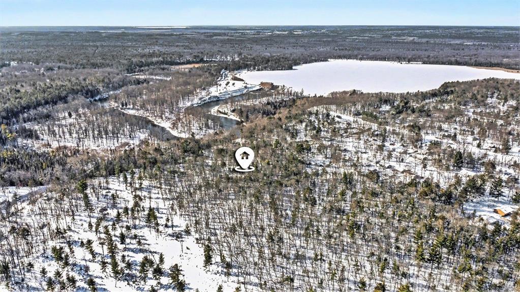 Discover a rare 8.5-acre retreat overlooking the beautiful Au Sable River. Set behind a gated entrance at the end of a private drive, this peaceful property offers privacy and quiet while still being just 6 miles from Oscoda. Approximately 5 flat acres sit at the top of the propertyÃ¢â‚¬"ideal for buildingÃ¢â‚¬"followed by a scenic hill that leads down toward the river bottom, where youÃ¢â‚¬â„¢ll find about an additional acre near the base close to the river. The property has been surveyed, and boundary lines are clearly staked. Towering mature trees, including red pine, oak, white pine, and Douglas fir, create a beautiful natural setting, with established trails winding throughout the property. Five fieldstone firepits are thoughtfully placed across the acreage, each offering its own spot to gather and relax. A well installed in 2024 is already in place, and multiple building sites provide flexibility for your future home or getaway. A stunning overlook captures sweeping river views, with Consumers Energy owning and maintaining the riverfront below for added peace of mind. Wildlife is abundant on the property with bald eagles, deer, and turkey as frequent visitors. A walking trail leads down to the river, and a nearby public boat launch makes it easy to enjoy exceptional fishing. Just down the road, thousands of acres of state land offer ORV and snowmobile trails for year-round adventure. Whether youÃ¢â‚¬â„¢re envisioning a private up-north retreat or a future full-time residence, this one-of-a-kind property offers space, privacy, and natural beauty.