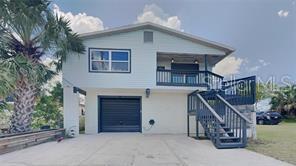 house was just inspected in Feb & Apr of 2026 for 4 Point and Wind Mitigation with No problems at all! both home inspection reports attached for you to check! YOU ABSOLUTELY WANT A 2-STORY HOUSE WHILE ALL 1-STORY HOUSES WERE FLOODED IN THE HURRICANES, IT IS NOT ON RIVER OR ON BAYOU, BUT ON REAL SALT-WATER CANEL DIRECTLY TO GULF OF MEXICO AND ALSO NO HOA. DIRECT GULF ACCESS IN ITS BACKYARD DOCK, DON'T NEED TO PUT BOAT ON A BOAT LIFT TO TRANSFER TO OR GO THROUGH A LOW BRIDGE TO SALTWATER CANAL. 4BR, 3BA, 3 TANDEM CAR GARAGE AND AN ABOVE GROUND POOL, ABSOLUTELY GORGEOUS, METICULOUSLY AND TASTEFULLY UPDATED, PACKED WITH LUXURIES, A WATERFRONT POOL HOUSE WITH MOST ROOMS ON THE 2ND FLOOR THAT HAVE NEVER BEEN TOUCHED BY FLOOD. this is A desirable house that you could enjoy the Florida style living while also don't need to worry about flood. NO HOA OR SINKHOLE, so, you don't have HOA restrictions, HOA fees and sinkhole to worry about. house is great for long term or short term of Airbnb/Vrbo rent (since it HAS NO HOA), or for a large family that likes to live in the Florida waterfront dream to entertain or to run a business from home. Renovated of 4/3/3 with workstation and storage, fenced backyard and outdoor kitchen, patio and magnificent open balcony on the water, no neighbor on either side. it's not only on the water but also very close to all major roads, within 1hour to Tampa, Clearwater, St Pete Etc. Newer interior and exterior paint, carpet, laminate and porcelain tile floor, lights, mirrors and so many more. Upstairs is bright with hard flooring through the main areas, open floor plan and plenty of natural light. The upgraded kitchen features stone countertops, stainless steel appliances, sink and pull off kitchen faucet, shaker cabinets and custom backsplash. the study could also be a 5th bedroom, Spend time with family and friends on the deck with beautiful water views. Roof 2019. AC 2020. Water heater 2020, everything in the house updated in 2020. located just off of US19, minutes to Hudson beach and Super Walmart, Sand Bar, Durney key, Anclote, Honeymoon, Caladesi Island, 20min to Suncruz Casino, variety restaurants and Port Richey waterfront park, Brasher Park, Gulfview Square Mall, small keys, springs, crystal river. Book your private showing today, A MUST SEE!