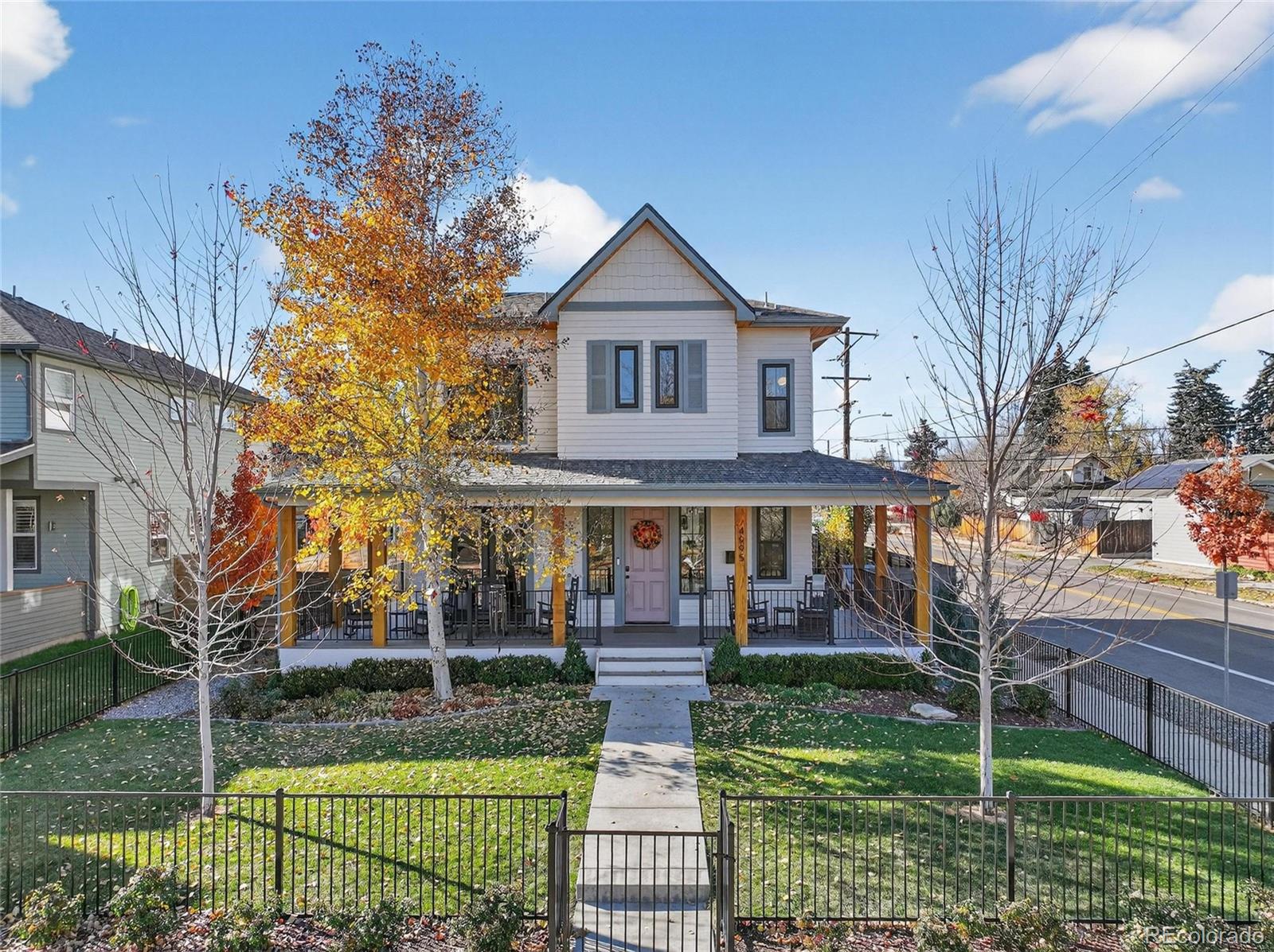 Perfectly positioned on a beautifully landscaped corner lot in the highly sought-after Berkeley neighborhood, this newly renovated residence offers a lifestyle of comfort, sophistication, and thoughtful design. From the moment you enter, you’ll notice the meticulous attention to detail, natural light, and seamless flow that define the home. At the heart of the main level, the open-concept kitchen, living, and dining area creates an inviting and cohesive space ideal for both everyday living and memorable gatherings. A striking waterfall island serves as the centerpiece, complemented by custom built-ins and a warm, elegant fireplace that elevates the ambiance. Large windows illuminate the space throughout the day, enhancing the bright and airy atmosphere. The upper level offers a serene primary suite complete with a private balcony, generous walk-in closet, and luxurious five-piece bath featuring an oversized shower and soaking tub. A charming reading nook provides a quiet escape and adds to the home’s unique character while splitting the primary suite from two additional bedrooms connected by a Jack-and-Jill bathroom. The finished lower level expands the home’s living options, offering a relaxed and comfortable setting ideal for movie nights, recreation, or a dedicated play area. Everyday ease continues with an attached two-car garage, allowing direct interior access regardless of the weather. Outdoor living has been thoughtfully curated with an expansive wraparound porch and three distinct entertainment areas, each providing opportunities for relaxation, gathering, and enjoyment. A fully fenced front yard completes the setting, offering both beauty and function. This refined and welcoming home balances elegance and livability, creating a space that feels instantly comfortable and unmistakably memorable from the moment you arrive.