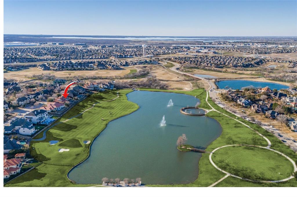 A RARE OPPORTUNITY! Stunning Golf & Lake Views in Castle Hills! Welcome to some of the most breathtaking views in the N Dallas area! This luxurious Custom Home is nestled within the EXCLUSIVE GUARD GATED COMMUNITY of Enchanted Hill! Every room in this exquisite home offers spectacular lake views, creating a sense of tranquility and elegance throughout. The exceptional floor plan includes a grand courtyard, a stunning foyer, and elegant dining room. The Chef’s kitchen is a masterpiece, equipped with top-of-the-line Subzero and Wolfe appliances, while the fabulous family room and large breakfast area provide plenty of space for relaxation. For entertainment, there are two game rooms, a spacious game room on the main level as well as another upstairs currently being used as a card room with a wet bar, perfect for entertaining! The large tiered media room doubles as an exercise room. The expansive 22x16 balcony off the game room offers panoramic views of the lush golf course and serene lake, making it an ideal place to unwind. The luxurious master suite is a true retreat, with a sitting area, spa-like bathroom, and a custom-designed walk-in closet. All other spacious bedrooms feature en-suite baths, ensuring ultimate comfort for family and guests. Step outside into your own Outdoor Haven, where you'll find a spacious loggia with a fireplace, a built-in grill, refrigerator, along with multiple areas for relaxation and entertainment.  Enjoy a sparkling pool, spa, firepots with water features, a firepit, lush grounds, and beautifully landscaped gardens. Additional features include the primary suite and two additional bedrooms on the main floor, an additional wet bar off the kitchen, a Spacious home office, wine room, plantation shutters, electric shades, imported lighting fixtures, and a 4-car garage. This extraordinary home offers a rare opportunity to live in luxury with unparalleled views and top-tier finishes. Don’t miss out on this once-in-a-lifetime opportunity!