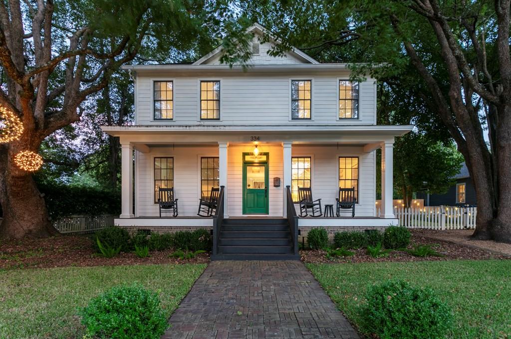Newest house in highly sought after Warren & Love historic district! This rare find is only a few footsteps from the bricks of Downtown Thomasville shopping, restaurants and entertainment, with recreation at our state-of -the art YMCA and pickel ball and tennis courts within the next block! Constructed in 2006 amongst 1800s -1900s mansions and cottages, enjoy the low maintaince and modern features of a home from this century with the charm of the past.  Approximately 1,740 Sq. Ft  3 large bedrooms, 2.5 bath , primary bath with separate luxury shower and footed tub, reclaimed heart pine flooring, designer touches such as custom lighting, stainless steal counter tops and appliances in the kitchen, including gas stove, overlooks cozy living area with fireplace. perfect for casual entertaining. Formal dinning room and parlor all on the main floor. Rocking chair front porch to enjoy the timless view of neighboring porches and canopy trees,  coupled with a spacious back yard complete with new wooden grilling party deck and privacy fencing, with lighting to set the mood for any occasion. Too many upgrades to list  with this beautifully maintained home, a must see!
