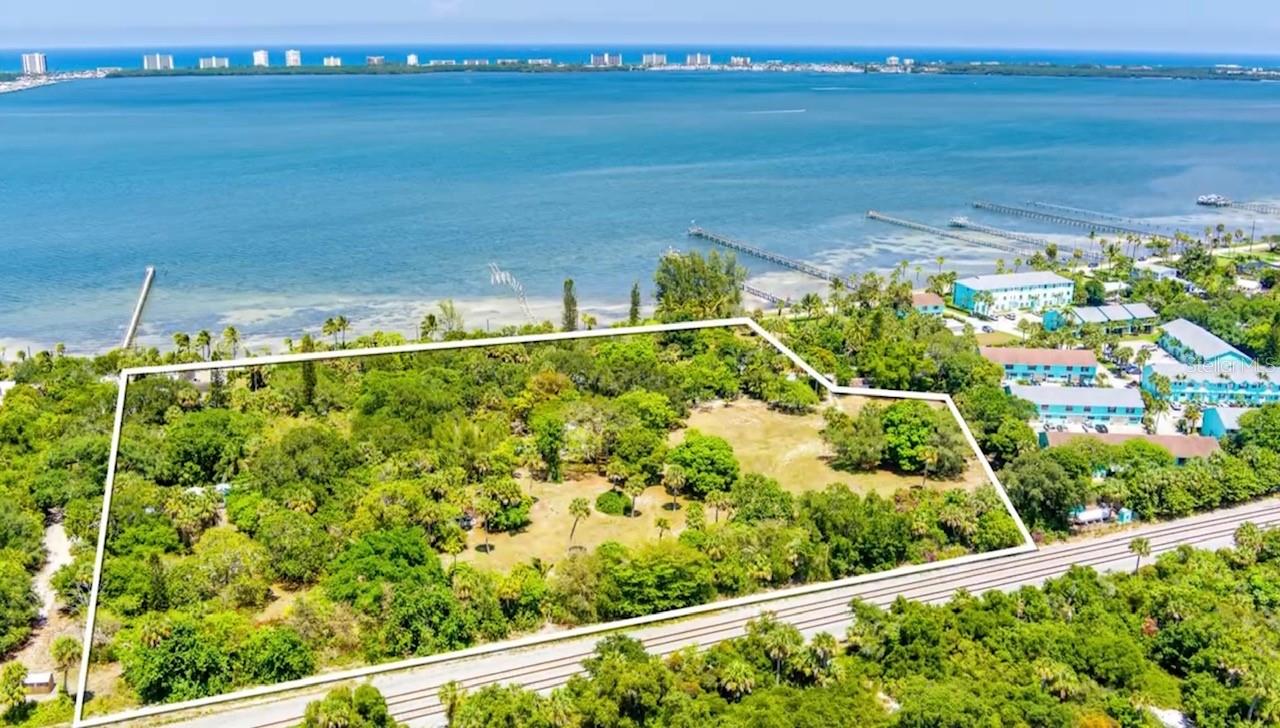 Discover Edenlawn Plantation—A rare waterfront opportunity with a rich legacy on Florida’s Treasure Coast!Welcome to nearly 9 acres of Florida’s history with remarkable water views and 700 feet of direct waterfront along the scenic Indian River Intracoastal Waterway. This sale includes 4 parcels. Its size, zoning, location, and storied past offer endless possibilities—whether you envision a private family compound, luxury estate development, boutique retreat, or the restoration of its historic legacy.A stately plantation home, now in disrepair, sits near the water’s edge on the northeast corner of the property. Originally, it was home to the region’s largest pineapple plantation. At its peak, the plantation featured a railway depot and a 1,500-foot dock that supported Florida’s growing pioneer economy. Several smaller cottages accompany the main home—each offering opportunities for restoration or replacement today.After the pineapple industry declined post-WWI, Edenlawn became a nursery and fernery, later a seasonal resort for the wealthy, and eventually a beloved Treasure Coast restaurant in the 1950s. Approximately half of the acreage is cleared and ready to be reimagined. Small homes remain on the rest of the property—many in disrepair, though some are habitable.The property includes three wells, 16 electric meters, a swimming pool overlooking the Indian River, pineapple statues, mature oaks, winding pathways, one functioning dock, and another with only the pilings remaining. This property is a true vision of the Florida coastal lifestyle. With whispers of the past blowing through the palm trees, it has inspired history books, the Zeke Adams fictional series, and the famous Highwaymen artist A.E. “Bean” Backus, who painted landscapes on and of the property.This is more than a property—it is an opportunity to steward a living piece of Florida history.All information was obtained from public records and is deemed to be correct. Please independently verify all information, including but not limited to zoning, square footage, utilities, local regulations, historical significance, and taxes. Do NOT go to or enter this property without the listing agent present. Sale in addition includes Parcel #'s 4509-130-0005-200-1, 4509-130-0009-000-7, 4509-130-0008-000-0. More photos and videos can be provided once prequalification received.