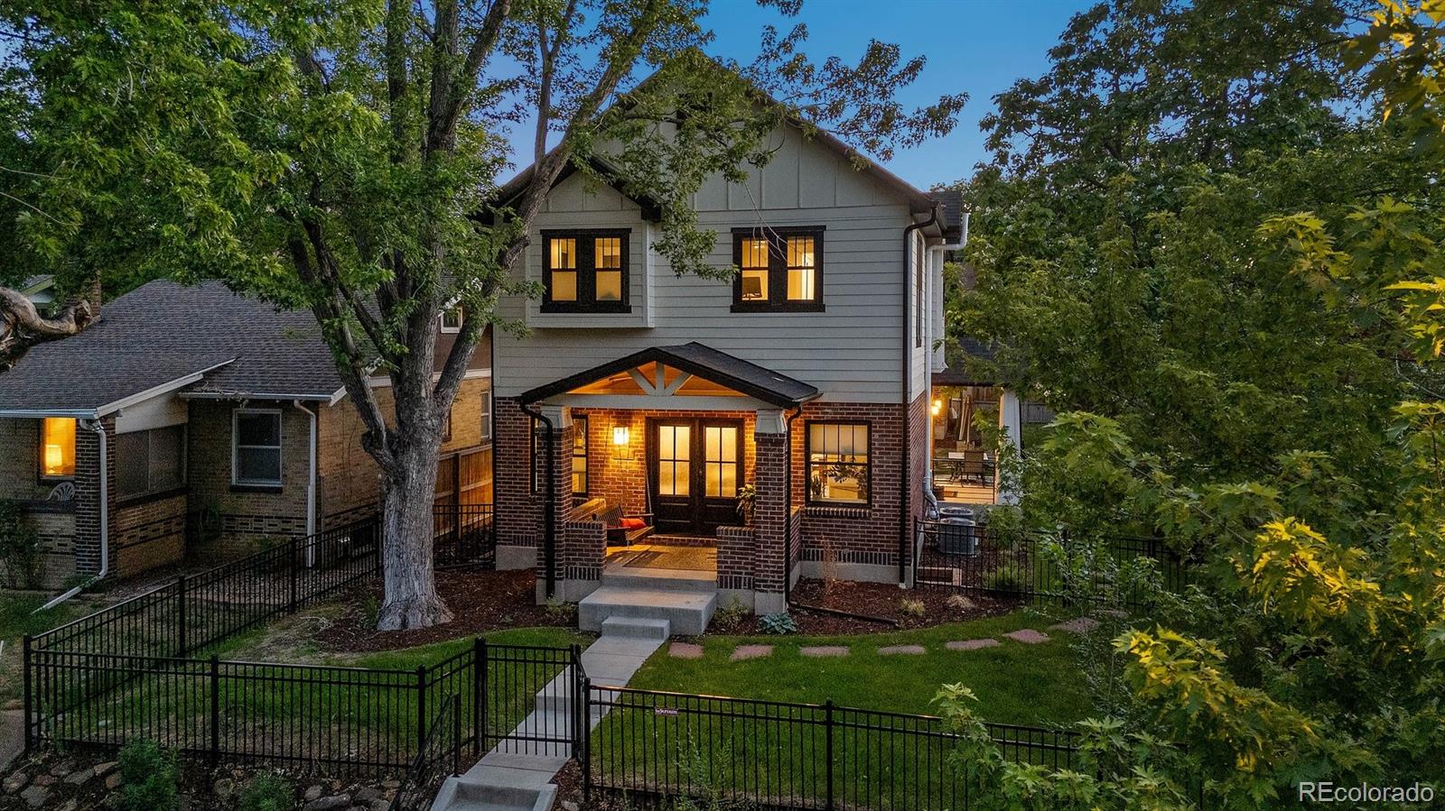 Located just a few blocks north of Highlands Square on an oversized, 6,250 sq/ft lot, this meticulously executed 4-bedroom, 3.5-bath "Pop Top" expansion offers of thoughtfully designed living space at every corner. Originally a 1920s bungalow, the home underwent a complete down-to-the-studs renovation in 2023, including all-new electrical, plumbing, HVAC, Anderson windows, and an architectural roof. The main level features 8" wide hand-scraped mahogany floors, custom architectural millwork, and a chef’s kitchen equipped with a 36" Bosch gas range, a farmhouse brick backsplash, and a custom island crafted from reclaimed roof framing. Upstairs, the vaulted primary suite serves as a private retreat, complete with a curbless shower and heated bathroom floors. The fully finished basement adds versatile living space, featuring a legal bedroom with a large egress window. True to its Craftsman roots, the exterior boasts three distinct porches, a 2-car garage with alley access, and a massive, fully fenced yard with a professional sprinkler system. Turnkey luxury in one of Denver's most walkable neighborhoods. **Preferred Lender Credit of up to 1% of loan amount. All loans are subject to approval. Terms and conditions apply. Lender is a licensed loan officer in the state of Colorado. Call listing agent for more info.**
