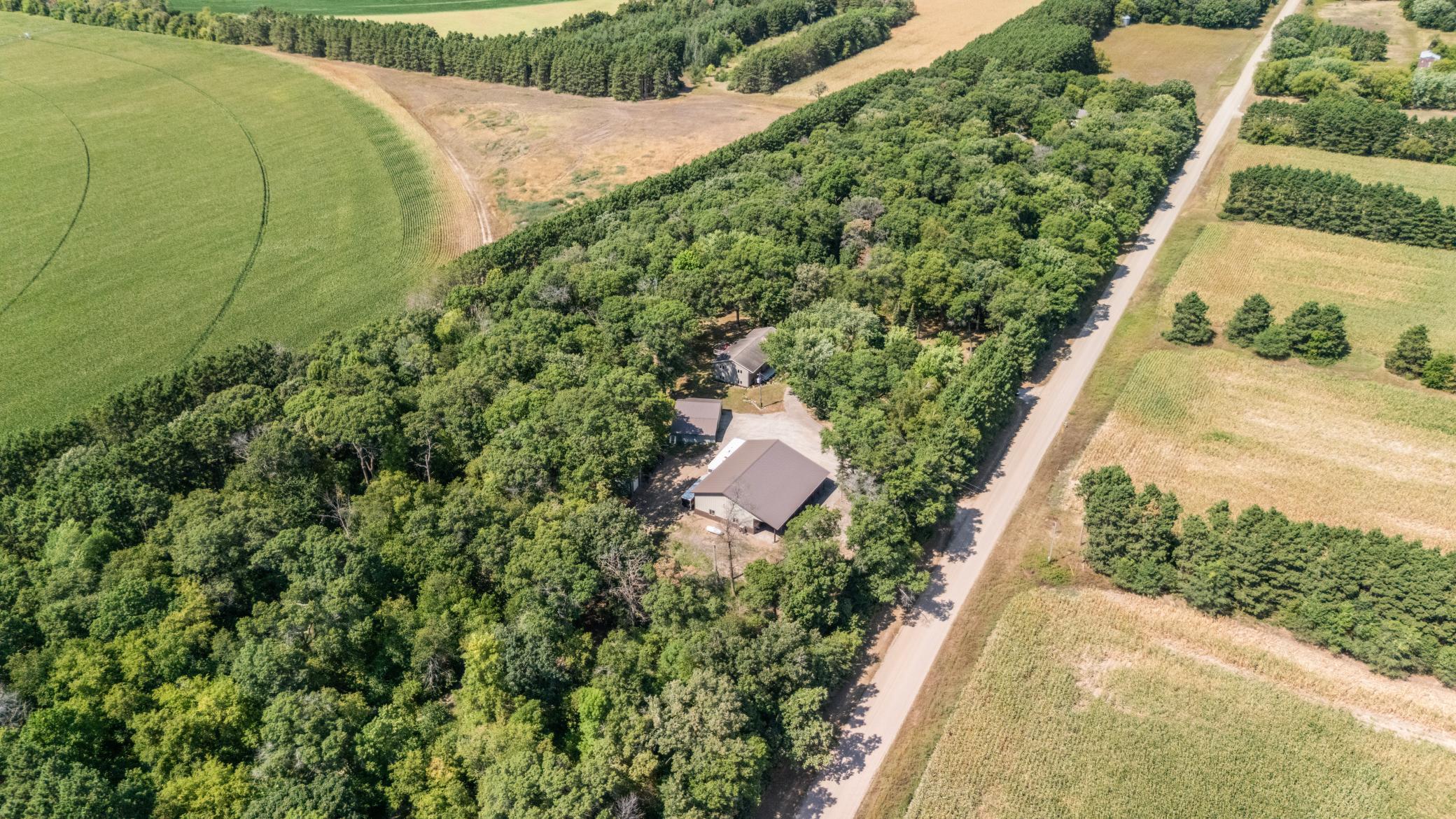 Move in ready, meticulously maintained 3 bedroom 2 bath with storage for 14 vehicles, toys, campers, animals & more all on 10+ wooded Acres with convenient location