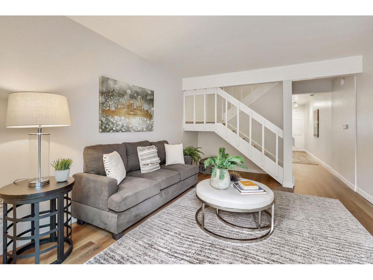 Ideal opportunity to live in the heart of Historic Mapleton Hill in this nicely updated 2-bedroom, 1 bath condo. Great complex location - corner upstairs unit with south facing balcony to Maxwell Avenue! Condo has new paint and new high end laminate floor connecting the kitchen,dining & living room.Kitchen cabinets are maple.Upper level has new carpet in stairwell, hallway & bedrooms. High end washer & dryer conveniently located in kitchen area. This property sparkles and is ready to move into! Private outdoor community pool and courtyard. Building had major renovation. New siding, awnings, and balconines. Enjoy everything Boulder has to offer with Pearl Street dining and shopping just minutes out your front door. Mount Sanitas hiking nearby. Fantastic location for Sundance Film Festival!