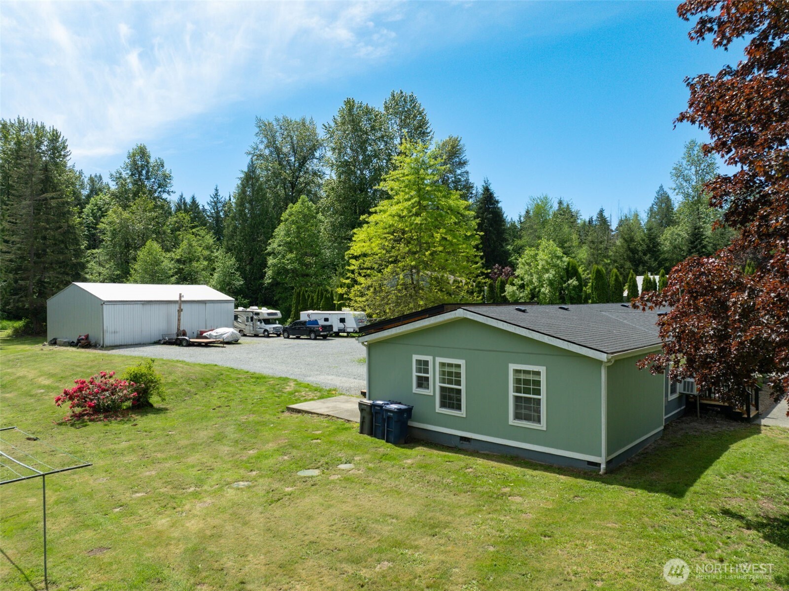 Set on 6.5 acres, this beautiful home offers the perfect blend of peaceful country living with convenient access for commuters. Inside, you’ll find an inviting open floor plan with soaring vaulted ceilings that create a bright, airy feel. The heart of the home is a stunning chef’s kitchen featuring a large island—perfect for gathering, entertaining, and everyday living.The spacious three-bedroom layout includes a generous primary suite with abundant closet space and a private ensuite bath, complete with double vanities and a luxurious dual shower.  The spacious three-bedroom layout includes a generous primary suite with abundant closet space and a private ensuite bath, complete with double vanities and a luxurious dual shower. Step outside and imagine the possibilities—create your dream garden, enjoy birdwatching, grow your own food, or simply relax and take in the natural surroundings. There’s ample space for RV parking, hobbies, home-based business needs, and more. Recent updates throughout the home add both style and peace of mind, including newer flooring, decking, a covered back deck, front porch, Hardiplank siding, fresh paint, stainless steel appliances, a brand-new furnace with transferable warranty, updated blinds, and energy-efficient LED and recessed lighting. The impressive 1,440 sq ft pole building is a standout feature, complete with a lift—ideal for projects and workspace.  This property offers the best of country living. Buyers got cold feet.