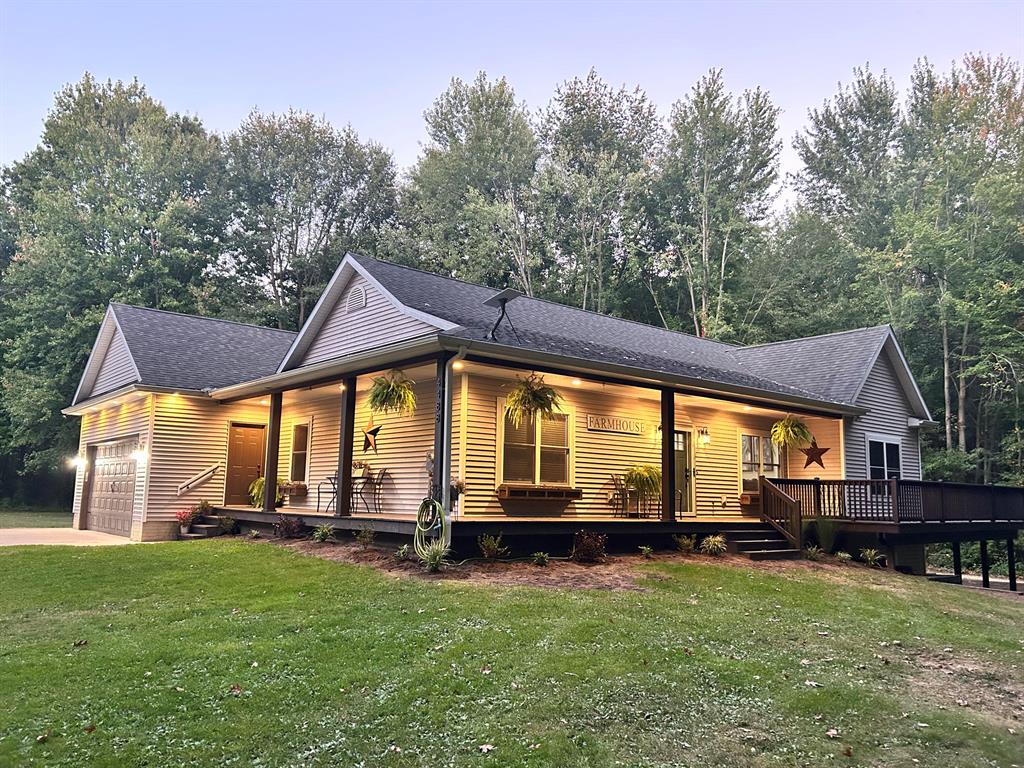 Experience this impressive custom-built 4-bed, 2-bath home, perfectly situated on 5.3 acres of serene, private land. Tucked away 300 feet from the road in a beautiful wooded setting, offering an incredible blend of modern elegance & natural beauty. It's covered porch, expansive decking, & concrete surround, this home exudes quality & attention to detail. The 90% finished basement adds valuable space & includes a 3rd almost finished bath, making it perfect for gatherings or entertaining. Efficiency is a priority here, featuring spray foam & batt insulation combined with a state-of-the-art geothermal heating and cooling system that ensures remarkably low utility costs throughout the year.  Advanced well system provides ample pressure, perfect for an irrigation setup. Also you'll find a large shed equipped with full electrical service, insulation, & heating, along with a luxurious goat shelter & small pasture, ideal for mini goats. Showcases pride of Ownership & meticulous care.