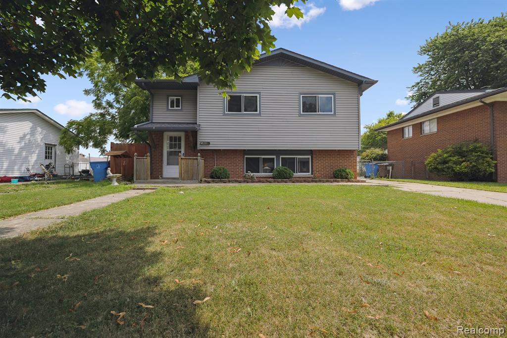 Welcome to this well-maintained 3-bedroom, 1.5-bath brick and vinyl bi-level home located in a highly desirable area of Gibraltar. The spacious primary bedroom—originally two rooms—offers plenty of space and flexibility. Enjoy natural light in the inviting living room, perfect for relaxing or entertaining.
The kitchen features granite countertops, ample cabinet space, and a functional layout for everyday cooking. The oversized,  two-car garage includes a work area, and there’s an additional shed on the property for even more storage. Conveniently located near schools, highways, a state park, marina, and shopping. Major mechanicals are updated with a new furnace and A/C installed in 2017. $135,000 is assumable under a 3.86 FHA mortgage rate.