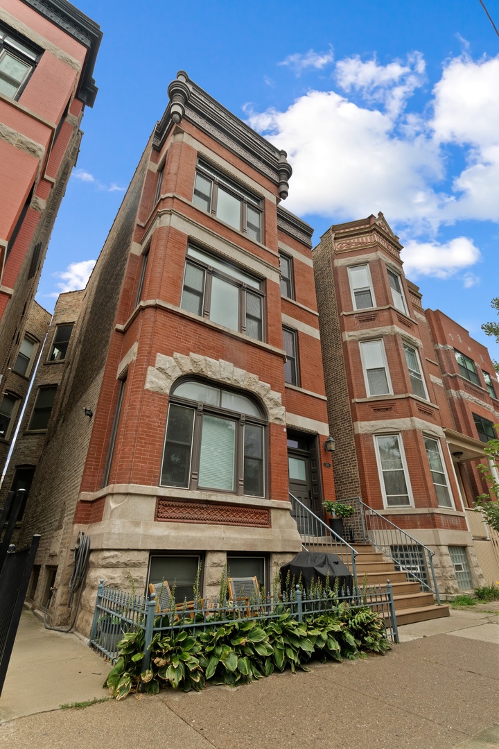 This beautiful 2-bedroom, 1-bath condo offers the perfect blend of vintage charm and modern finishes in one of Chicago's most vibrant neighborhoods. Set in a striking Victorian building fully rehabbed in 2009, the unit features an open floor plan with white oak hardwood flooring, high ceilings, and a private deck off the living area.    The sleek kitchen is equipped with Italian Copat cabinetry, quartz countertops, subway tile backsplash, and high-end stainless steel appliances. The spa-inspired bathroom boasts Italian porcelain tile, floating cabinetry, and premium fixtures by Toto, Danze, and Grohe. Additional highlights include generous closet space, smart-home wiring, in-unit washer and dryer (2020), newer HVAC, a tankless water heater (2021), a common rooftop, and a roof replacement in 2021.    Situated on a quiet residential street yet just steps from Division Street's dining, shopping, and nightlife, this impeccably maintained home offers both convenience and character in a boutique six-unit building.