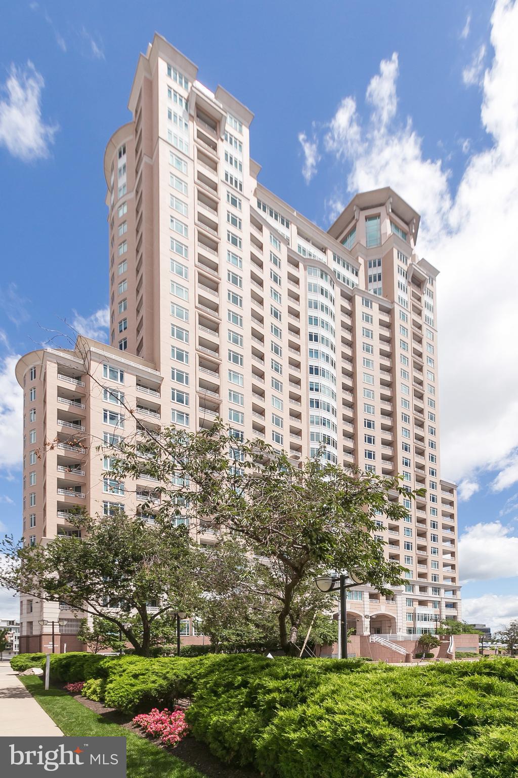 LUXURY CONDO AT HARBORVIEW TOWERS, The Place to be Impressed! As you enter through the elegant double door foyer of unit 1610, enjoy the panoramic harbor-scape vistas from every vantage point.  This exquisite floor plan is designed with bay windows and three balconies with which to capture relaxing sunrise and sunset. Unit 1610 boasts views of the Inner Harbor, both stadiums where you will witness the spectacle of cheering fans,  along with the many fireworks and the sunsets that fall upon unit 1610's interior open space. Completely remodeled home with many contemporary expressions of refined luxury. Intricately crafted three-piece crown moldings, wide plank light wood flooring, artistically carved granite back-splash, professional energy efficient stainless appliances, and meticulously designed and detailed tile shower all add superior value to this home. Second bedroom can also be used as an office.  The three balconies each offer it's own panoramic view of the city. From the Inner Harbor to Fed Hill to the Harborview Marina and Domino Sugars, it invites you. The unit was designed and renovated to the specifications of the discerning executive who commands the best in every detail of life.   (pictured artwork excluded).  At Harborview, there are no compromises. Harborview Towers offers indoor and outdoor swimming, sauna, whirlpool, steam room, full executive gymnasium, business center, social lounges, concierge services including valet parking, hotel like amenities to include  two additional guests hotel rooms that can rented for a modest fee, a private dining room/board room, outdoor grill area, and other activity rooms that can be reserved/rented. Harborview offers an attached gated, well lit garage where you can rent monthy assigned spaces.  Harborview is unique in that it's location offers easy access to route 95. The easy access provides a fast 15 minute commute to BWI airport and all points south and north.   The Harborview Towers building was recently renovated and repointed making this condo a standout luxury Inner Harbor community, steps from an abundance of community amenities...  beautifully landscaped gardens, walking/jogging paths, water fountains, shopping, gourmet restaurants, and nightlife! A MUST SEE!