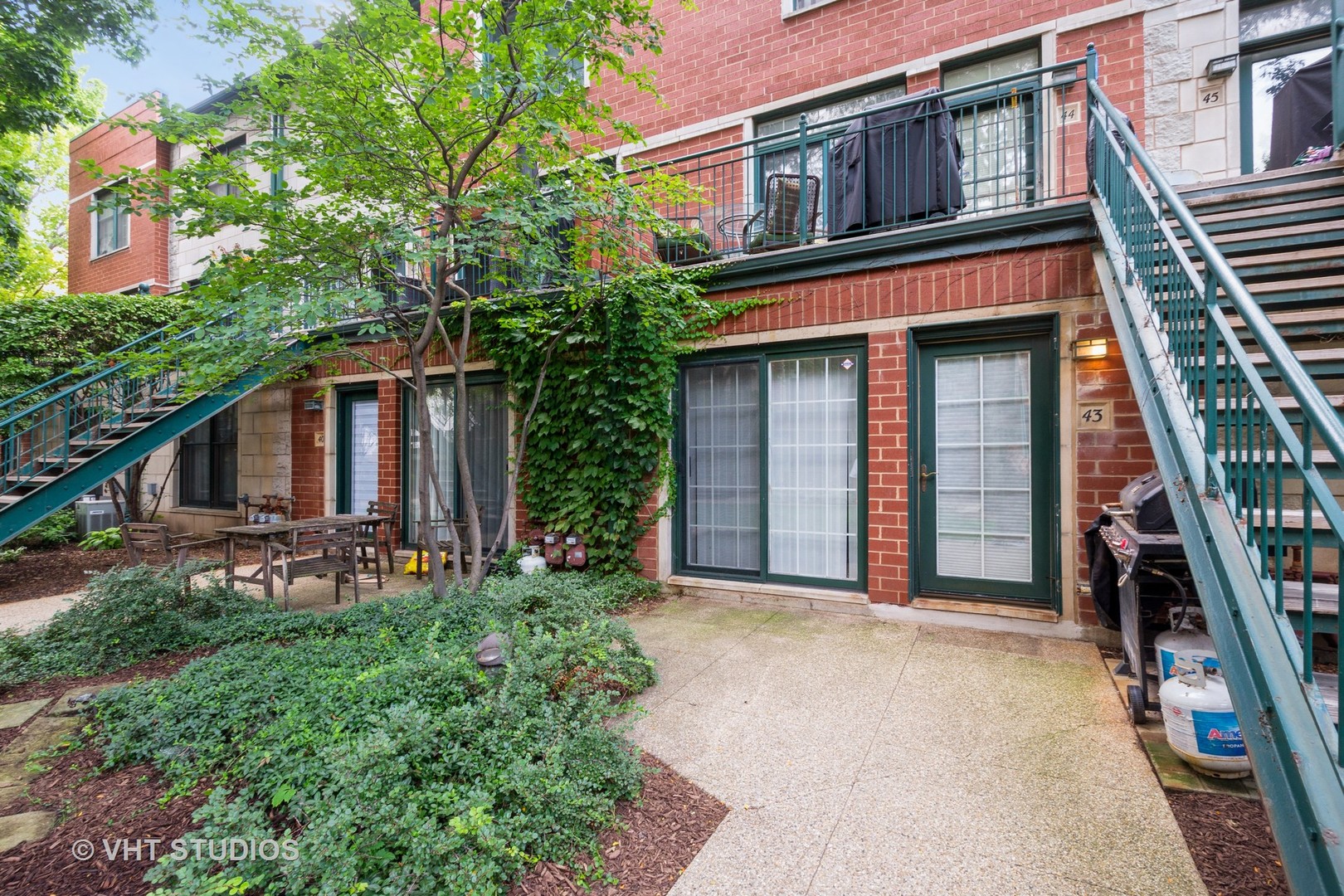 TWO BEDROOM CONDO LOCATED IN THE SOUTH LOOP IN THE DEARBORN VILLAGE COMPLEX.FEATURES INCLUDE ;KITCHEN WITH HARDWOOD FLOORING, FULL LINE OF APPLIANCES, 42'' CABINETS, GRANITE COUNTER TOPS WITH BREAKFAST BAR AND TRACK LIGHTING.IN UNIT WASHER/DRYER. LIVING/DINING ROOM COMBINATION, WITH HARDWOOD FLOORING, TRACK LIGHTING, VERTICLE BLINDS AND FIREPLACE WITH GAS LOGS AND MANTEL. MASTER BEDROOM WITH WALL TO WALL CARPETING, CEILING FAN AND LARGE WALK IN CLOSET.SECOND BEDROOM WITH WALL TO WALL CARPETING AND TWO CLOSETS. FULL BATH WITH SOAKING TUB, CERAMIC TILED TUB SURROUND AND FLOORING, DOUBLE BOWL SINK AND  MARBLE COUNTER TOP. FURNACE AND AIR CONDITIONING UNIT HAVE BEEN REPLACED WITHIN THE LAST TWO YEARS. ONE GARAGE PARKING SPACE PLUS AN ADDITIONAL EXTRA PARKING SPACE INCLUDED.   RARELY AVAILABLE. GATED COMMUNITY. CLOSE TO PUBLIC TRANSPORTATION. WALKING DISTANCE TO SOLDIER FIELD,   WINTRUST ARENA AND OUR BEAUTIFUL LAKE FRONT. WILL NOT LAST.