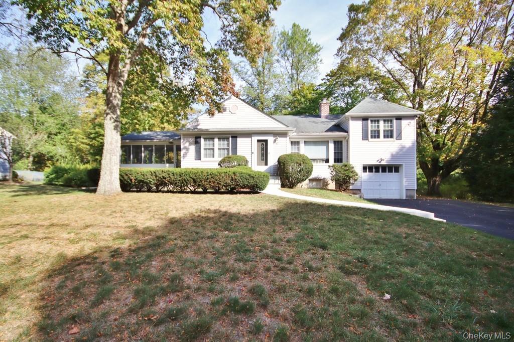 Wonderful split-level home located in a quiet neighborhood near a local park in the sought-after village of Briarcliff Manor. This suburban gem offers comfort, style, and access to exceptional community amenities. The home features an updated eat-in kitchen with granite countertops, perfect for everyday living and entertaining, with direct access to a fabulous screened-in porch overlooking the backyard. The formal dining room and spacious living room showcase beautiful hardwood floors, a vaulted ceiling, and a charming brick fireplace that creates a warm and inviting atmosphere. The newly painted primary bedroom offers generous space with his-and-hers closets and a beautifully updated luxurious bathroom featuring an oversized rainforest shower and dual vanities. Three additional bedrooms and an updated hall bathroom complete the second floor. The lower level provides a comfortable family room with outdoor access, along with a laundry room, office space, and powder room, offering flexible living options. Additional highlights include a large unfinished basement, ideal for storage or future possibilities. Enjoy endless outdoor living with the screened-in porch, patio, and level backyard, perfect for relaxing or entertaining. A rear shed provides convenient storage for outdoor equipment. As a resident of Briarcliff Manor, you'll enjoy access to outstanding community amenities including an outdoor pool, youth programs, senior services, recreation activities, and year-round special events. This home truly offers the best of suburban living in a vibrant community. There are no audio recording devices inside this property.
