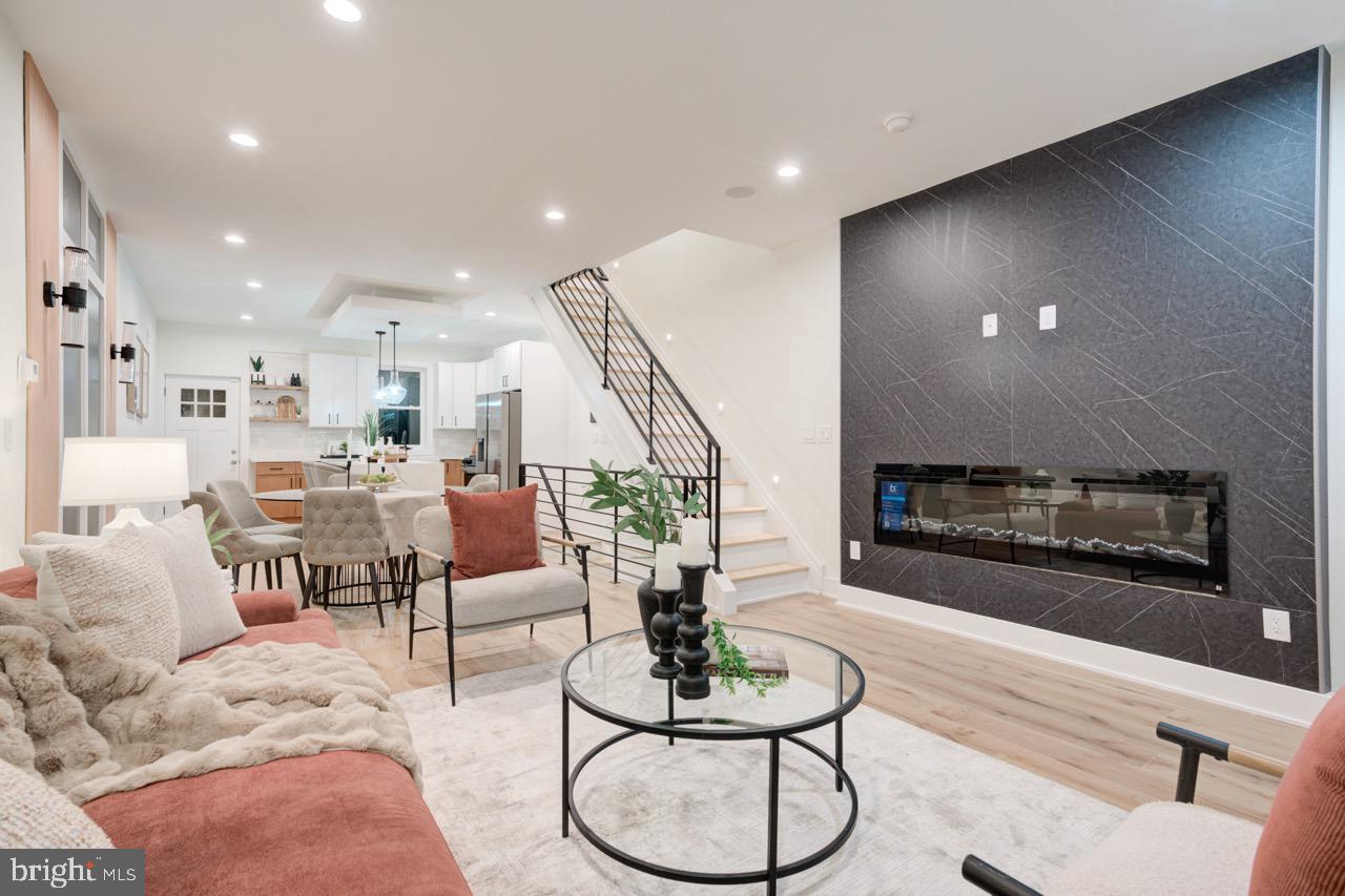 Welcome to 2620 E Harold Street — a beautifully finished, brand-new home that’s part of an exclusive 4-property development. This impressive residence offers 4 bedrooms, 3 bathrooms, and approximately 2,300 square feet of thoughtfully designed living space, all just minutes from the heart of Fishtown.Step inside to an open-concept main level where soaring ceilings, engineered hardwood flooring, and upscale finishes create an inviting and modern atmosphere. At the center is a stylish chef’s kitchen featuring a spacious island, sleek cabinetry, and a premium appliance package. Sliding glass doors lead to a private rear patio—ideal for outdoor dining, entertaining, or simply unwinding.The second floor includes two well-sized bedrooms and a contemporary full bathroom. The entire third floor is dedicated to a luxurious primary suite, complete with ample closet space and a beautifully appointed bathroom designed for comfort and relaxation. A convenient wet bar on this level provides easy access to the expansive rooftop deck, where you can enjoy stunning skyline views—perfect for hosting or relaxing.The fully finished basement adds valuable versatility, offering space for a second living area, home office, gym, or guest suite. It also features the fourth bedroom and an additional full bathroom, making it ideal for private accommodations.Additional highlights include dual-zone HVAC, built-in security and surveillance features, a New Construction Tax Abatement to help reduce monthly costs, and a 1-year builder’s warranty for added peace of mind. Located just steps from Aramingo Square Park and within walking distance to Fishtown’s popular restaurants, cafes, gyms, and shopping, this home perfectly combines modern luxury with everyday convenience.Schedule your private showing today.
