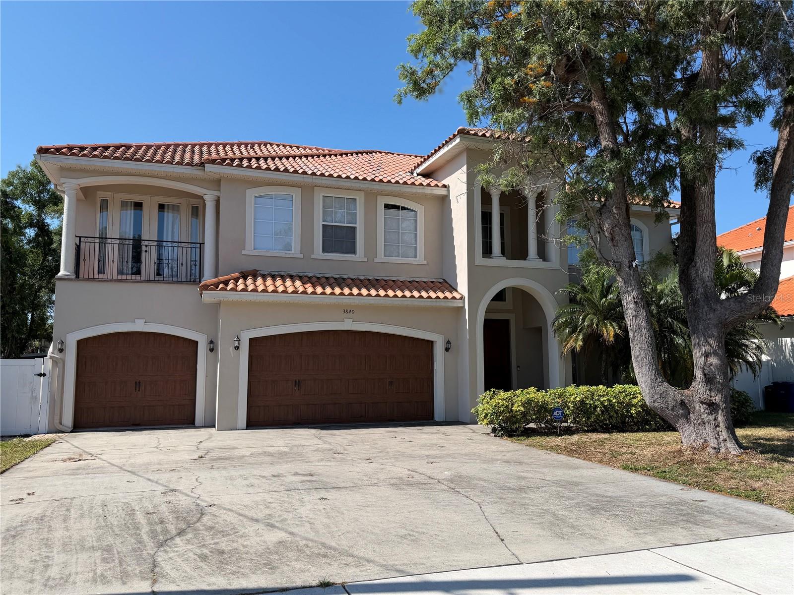 Stunning Renovated Pool Home in Virginia Park – This beautifully updated residence showcases timeless Mediterranean influences paired with fresh, modern finishes, all set in one of South Tampa’s most coveted neighborhoods. Recently completed renovations have transformed this 3648 square foot home into a move-in-ready retreat, offering six rooms (four with dedicated closets) and four bathrooms.The home impresses with its airy layout, elevated ceilings, and natural light highlighting the warm wood flooring throughout. The main living areas are designed for both everyday comfort and entertaining, including a spacious living area and a refined dining area.The kitchen is equipped with custom cabinetry, built in GE Monogram appliances, a generous island, breakfast seating, and ample storage. The adjacent family room opens to the outdoor living area, enhancing the home’s indoor–outdoor appeal.A room perfect for an office on the main level offers privacy and convenience, complete with a full bathroom and easy access to the pool. Upstairs, a flexible game or bonus room provides an ideal space for remote work, study, or play room. A private guest suite complete with balcony and en-suite bathroom ensures guests have a comfortable place to stay. The primary suite features an oversized walk-in closet and thoughtfully designed bathroom with double vanities, a soaking tub, and a separate shower. Additional Jack and Jill bedrooms and bath ensure plenty of room for guests.Outside, the backyard is designed for enjoyment year-round, with a stylish pool and spillover spa, spacious screened lanai, and paver patio perfect for backyard bbq’s. The fenced yard and mature landscaping enhances privacy, while a three-car garage offers generous storage and convenience.Located close to highly regarded schools (Roosevelt, Coleman and Plant), shopping destinations (International Plaza & Hyde Park Village), dining, major access points (15 min to Tampa Airport & easy access to bridges for beaches), Bayshore Boulevard for exercise, sporting events (15 min to Tampa Bay Bucs, Lightning, and NY Yankee spring training facilities), this home combines modern updates with a prime location for an exceptional living experience.