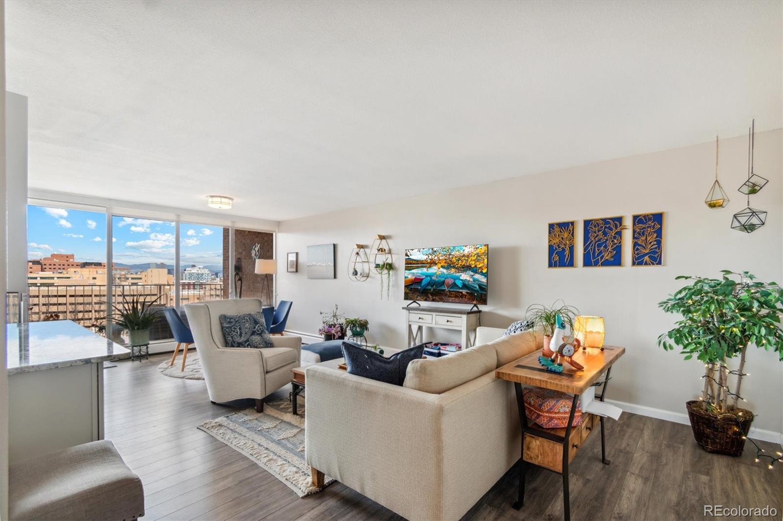 Discover urban luxury with breathtaking mountain views in this gorgeous Park Mayfair condo! This stylish 8th floor home offers 2 bedrooms, 2 bathrooms and a modern open layout flooded with natural light. The living room, primary suite and west-facing private balcony all showcase the stunning mountain vistas. The kitchen has been thoughtfully redesigned to an open concept floor plan with custom finishes throughout. The spacious primary bedroom is a retreat with a full bath, large walk-in closet and direct access to the balcony. The Park Mayfair condos are in a secure access building with incredible amenities including a new fitness center, sauna, indoor and outdoor pools and garden areas just to name a few. Just a short walk to all of the amazing dining, shopping and entertainment at 9th+CO. Come say hello!