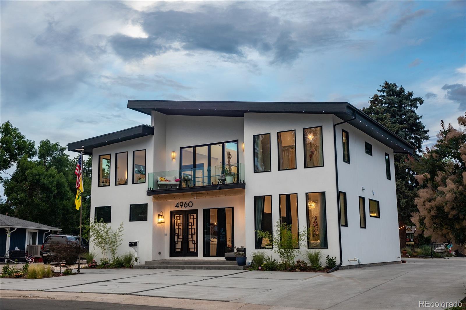 COMING SOON - This home was featured in the “Elway” documentary on NETFLIX, ensuring you are a part of Denver’s legendary quarterback - you can say, "this is my house!" This custom-designed masterpiece property, meticulously crafted with attention to every detail, has no expense spared in creating this exceptional home. This is 2 homes in one - ideal for extended family, guests, or as a private guest house, great for AirBnB opportunities, which the current owner has operated for the last 2 years! Boasting 8 generously sized bedrooms and 7 luxurious bathrooms, it's great for any size family. The gourmet chef's kitchen is a true highlight, featuring custom cabinetry, an oversized island, and a double-door hidden pantry for ultimate convenience. The open-concept floor plan seamlessly connects the kitchen, living, and dining areas, creating a perfect flow for gatherings. The private, main-level primary suite is a serene retreat with a stunning walk-in closet. Upstairs, you'll find additional well-appointed bedrooms, a spacious loft offering ample space for relaxation or entertainment, along with an all-glass office. The fully finished basement is an entertainer's dream, featuring a large gym and a dedicated movie room for ultimate leisure and recreation. The suite has its entrance, ensuring privacy and independence. The expansive driveway offers ample parking, perfect for hosting large gatherings, and includes a Tesla charging station for modern convenience.  You are across the street from the park, kiddie train station, creek, Pirates Cove and minutes from downtown Littleton. You can catch the LightRail to downtown Denver or anywhere else in town. This property is not subject to an HOA, which allows you the freedom to do what you please with the home, inside or out. Where else can you find a newer home like this, with everything it offers? This extraordinary residence offers unparalleled luxury and functionality—schedule a showing to experience it in person!!!