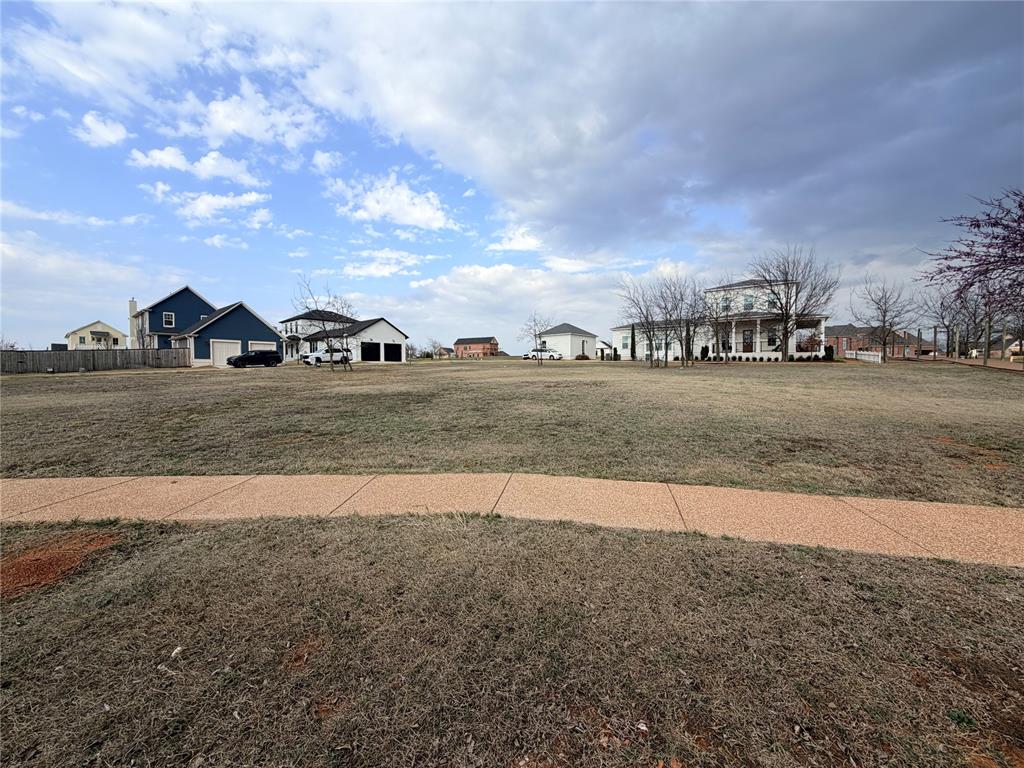 This is just one of the 5 Boardwalk lots left in our Sweetwater Village in Selah. This lot has immediate access to our newly added walking trails and a gorgeous view of the sunset. Just a couple of miles down an unassuming country road, only 10 minutes south of historic Norman, OK, you’ll find an up and coming wellness community…unlike any of its kind in Oklahoma. Selah offers 540 acres of front porch living, fresh air, fresh food, and focused on reconnecting family and neighbors. This walkable community is set among acres of preserved green space with miles of nature trails that connect homes and restaurants with arts and businesses. Partnerships are important to everything we do here at Selah. Our internationally recognized Architects and Design Professionals are making our Architectural Vision a reality, setting a new standard for Oklahoma Living. Our vision for Selah has and always will be inspired by the past, built for the future. With this in mind, Selah will be an ever evolving project as we truly listen to the needs and desires of our local community members. Give our office a call for more info on other lots in our community!!