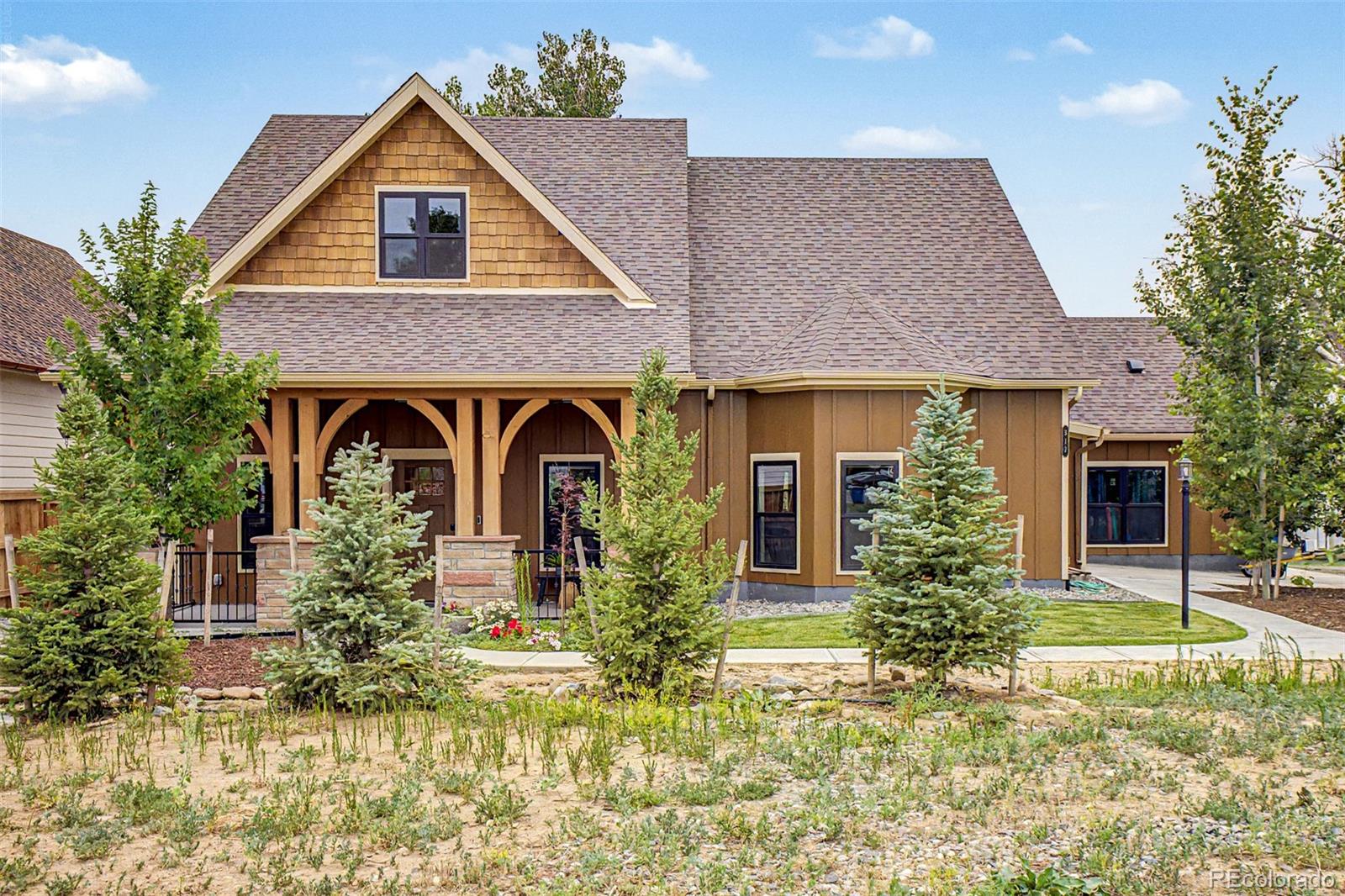Experience Colorado living in this exceptional custom-built new construction home in the heart of Old Town Superior. Surrounded by Boulder Open Space on the south and west with Coal Creek just beyond, this premier location offers immediate access to nearby trails while enjoying the charm of Old Town Superior. Thoughtfully designed with timeless character, this home blends cottage-inspired architecture with high-end finishes and exceptional craftsmanship. Clerestory and Anderson windows fill the home with natural light, while custom Craftsman trim, pocket doors, custom panel walls, reading nooks, wood shelving, and a Vermont Castings EPA-rated wood stove create warmth and style throughout. The chef's kitchen features a commercial-grade Viking 6-burner double oven and hood, double sinks, beverage bar with instant hot water, and a walk-through pantry. Four of the five bedrooms are private suites with baths, while the spacious upstairs bedrooms showcase vaulted ceilings. Spa-inspired baths featuring Italian tile, a deep soaking tub, custom closets, blackout blinds, and abundant storage add comfort. The 775-square-foot outdoor living area is the centerpiece of the home. A moving patio door system opens to a covered patio, seamlessly blending indoor and outdoor living. Complete with tongue and groove ceilings, a built-in gas grill, two-burner cooktop, wiring for TV, surround sound, and a fan, this backyard retreat was designed for entertaining. Pear, apple, and peach trees, raised garden beds, mountain and aspen grove views, and protected open space complete the setting. Additional highlights include a mud room with backyard access, laundry sink, waterproof shiplap, motion lighting, a 2.5-car garage with workbench, natural gas connection, RV-ready 30-amp service, and custom details throughout. This is more than a home -- it is a place to experience Colorado at its finest.
